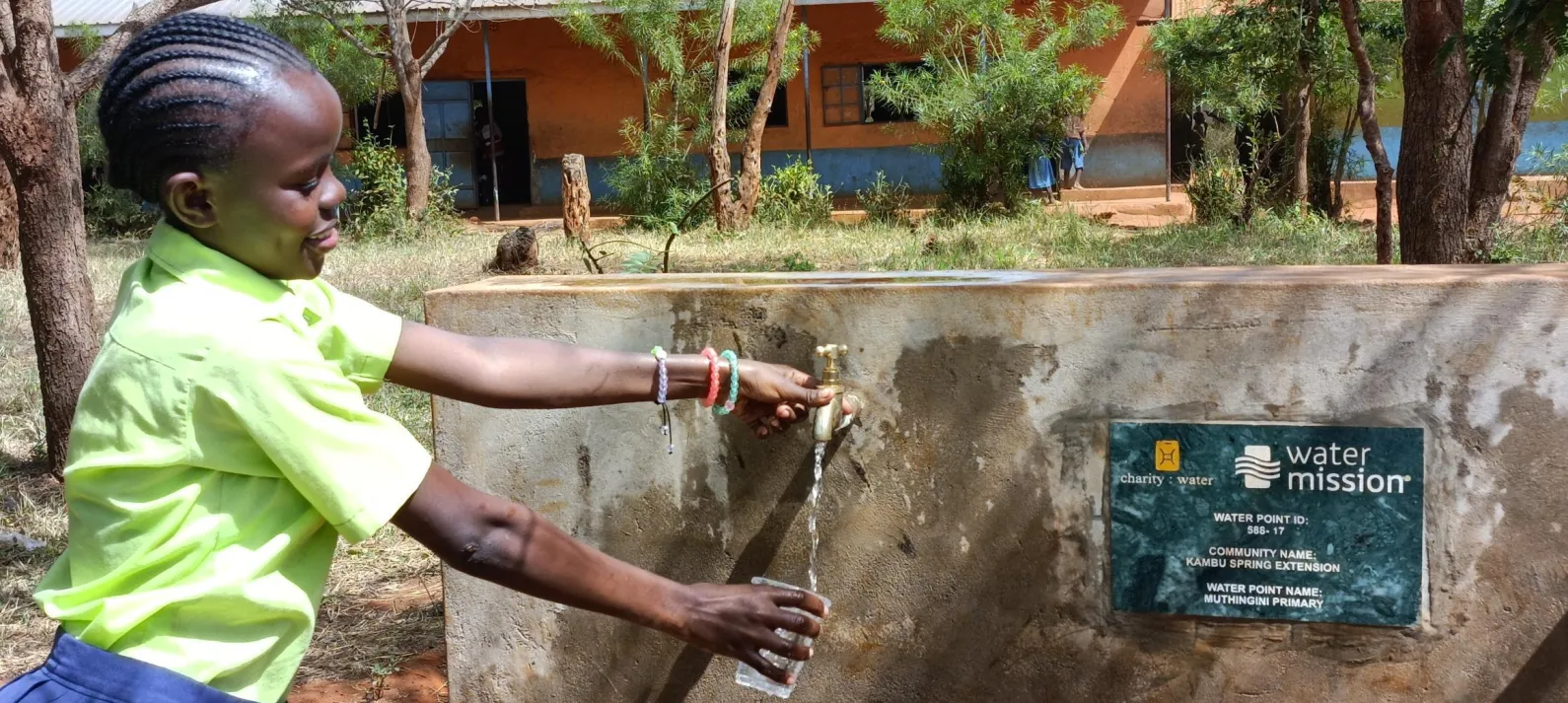 A schoolgirl in Kenya accesses safe water