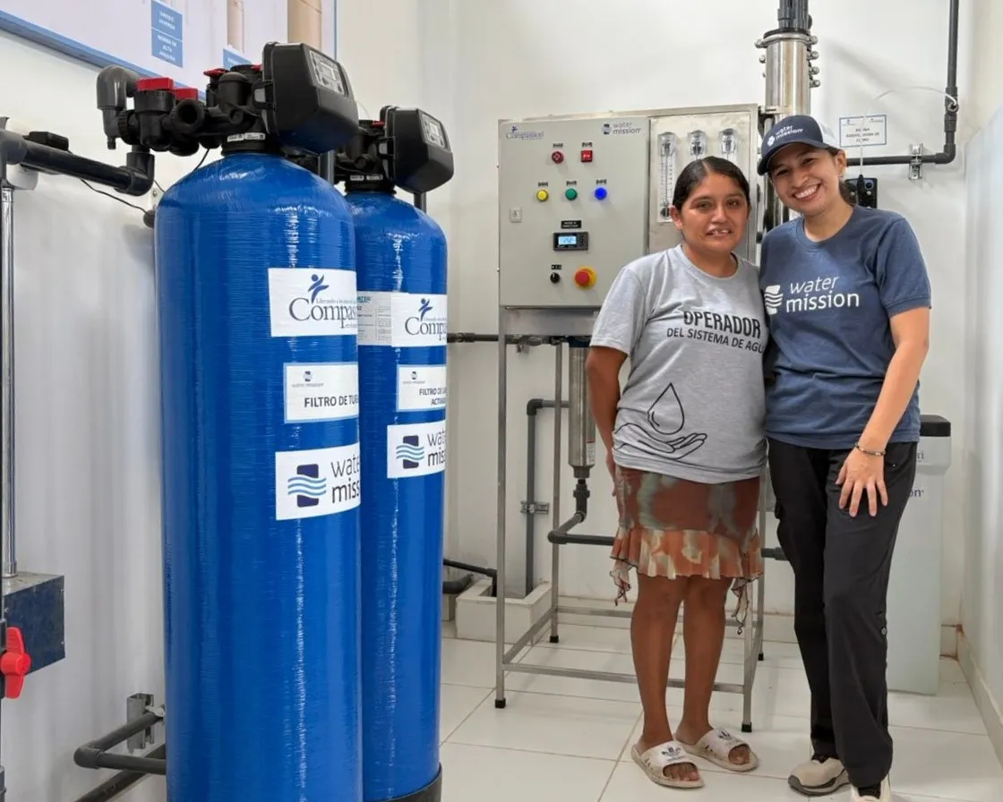 Water Mission Peru Country Director with beneficiary