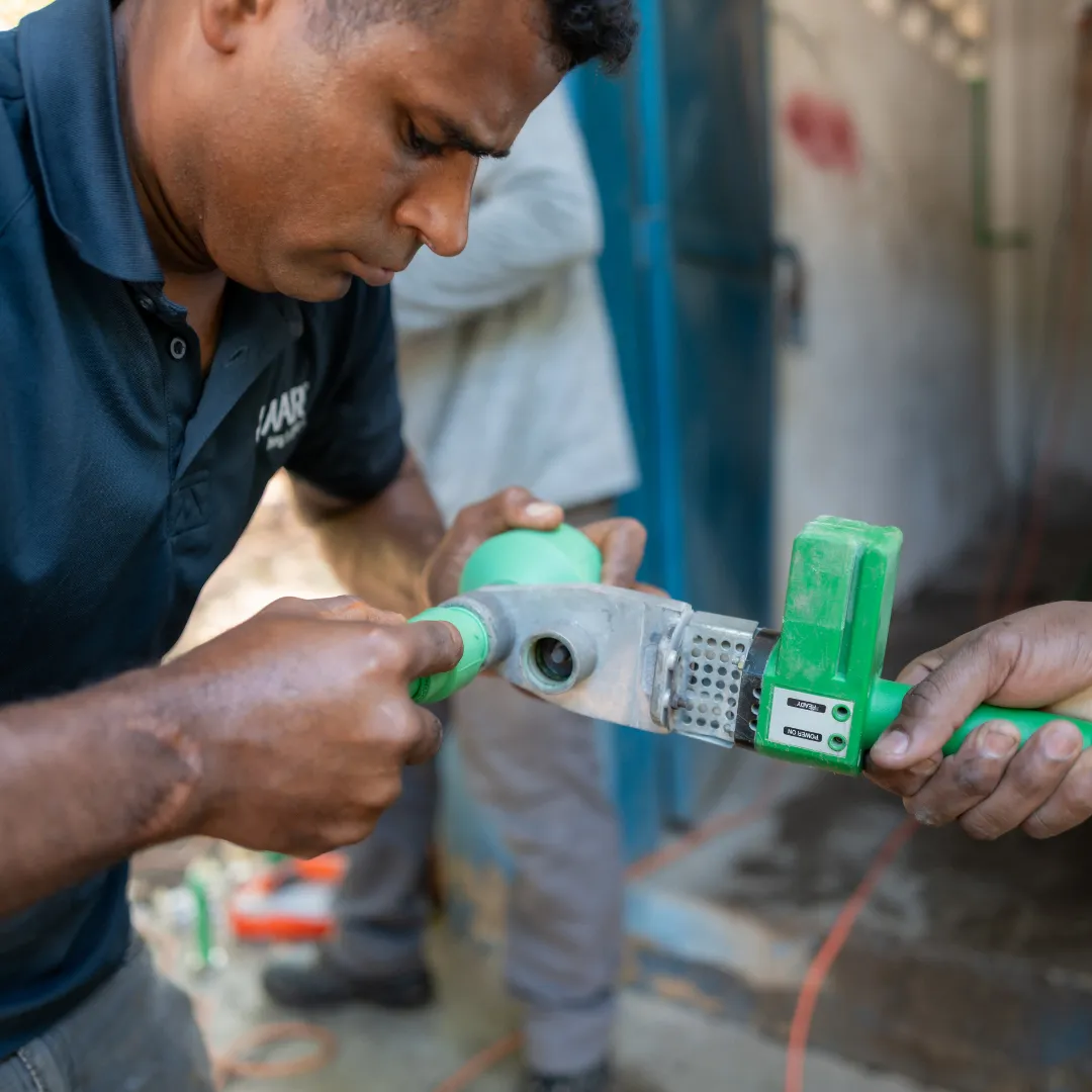 Water Mission DART assembles equipment for safe water system installation