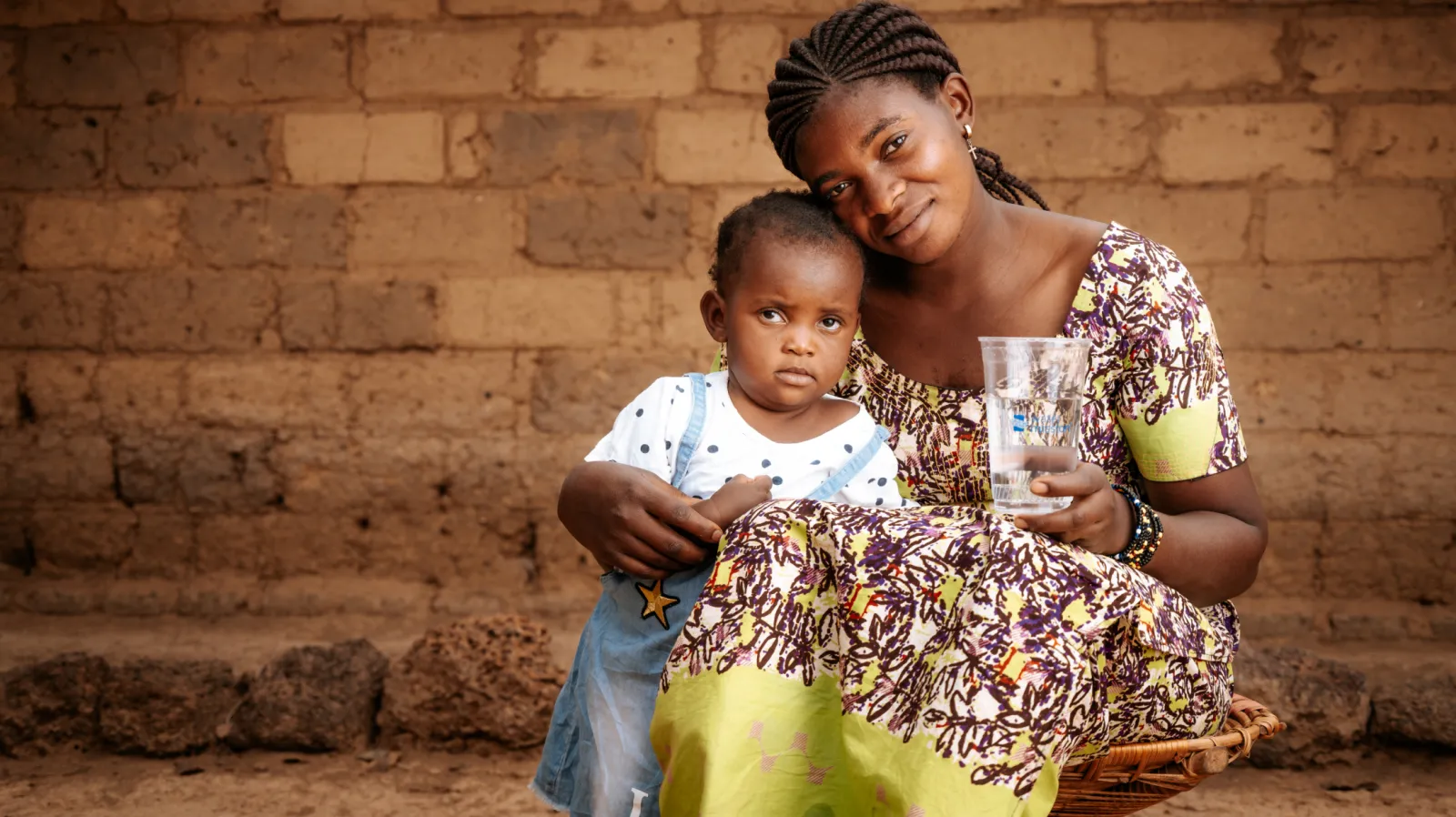 Mom and Child Drinking Safe Water