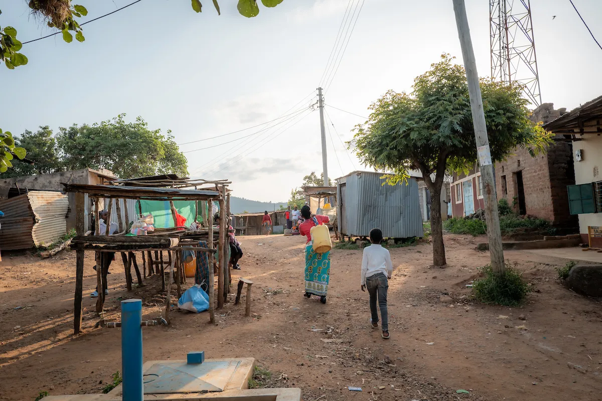 Mother and daughter fetching water