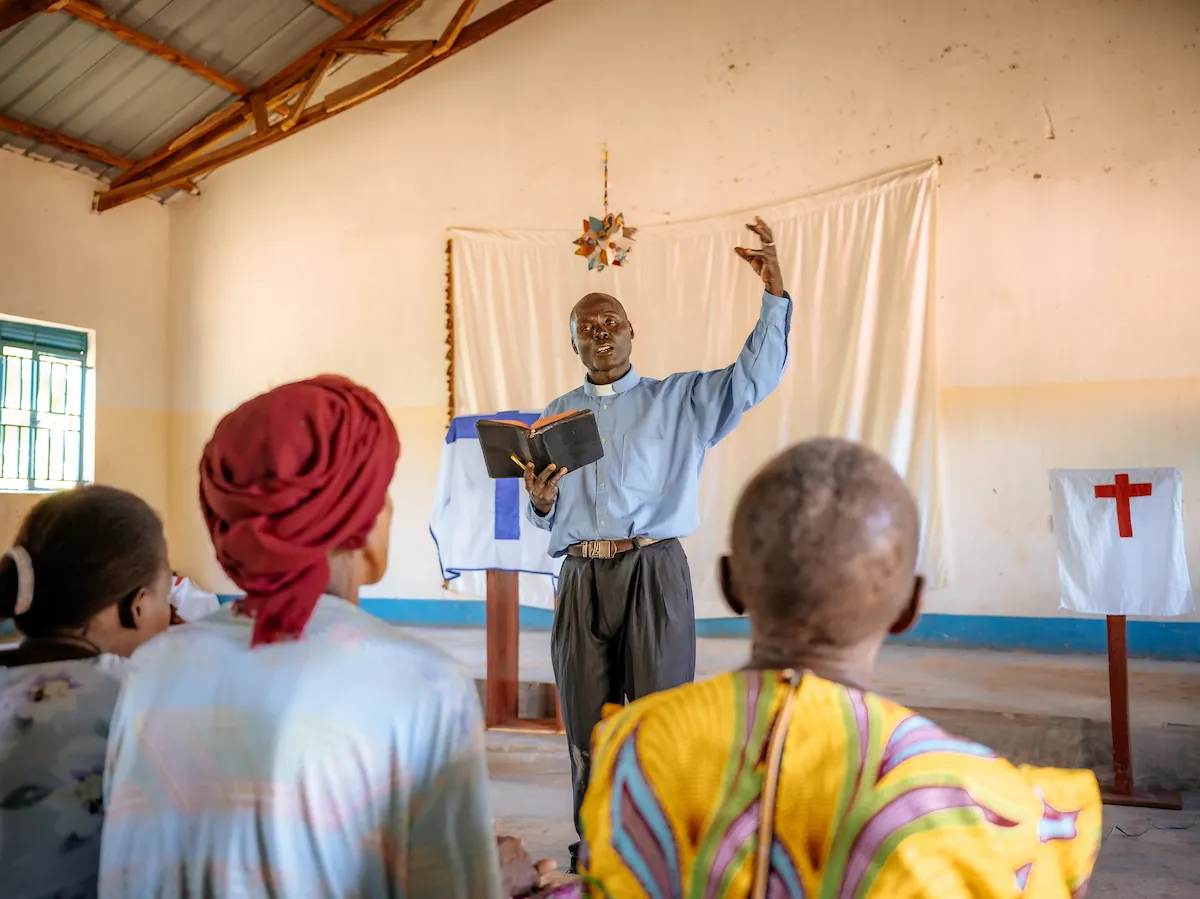 Pastor Laston preaching