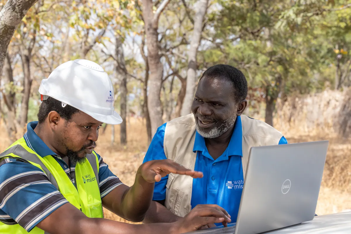 Water Mission Staff Monitor Safe Water Provision in Malawi