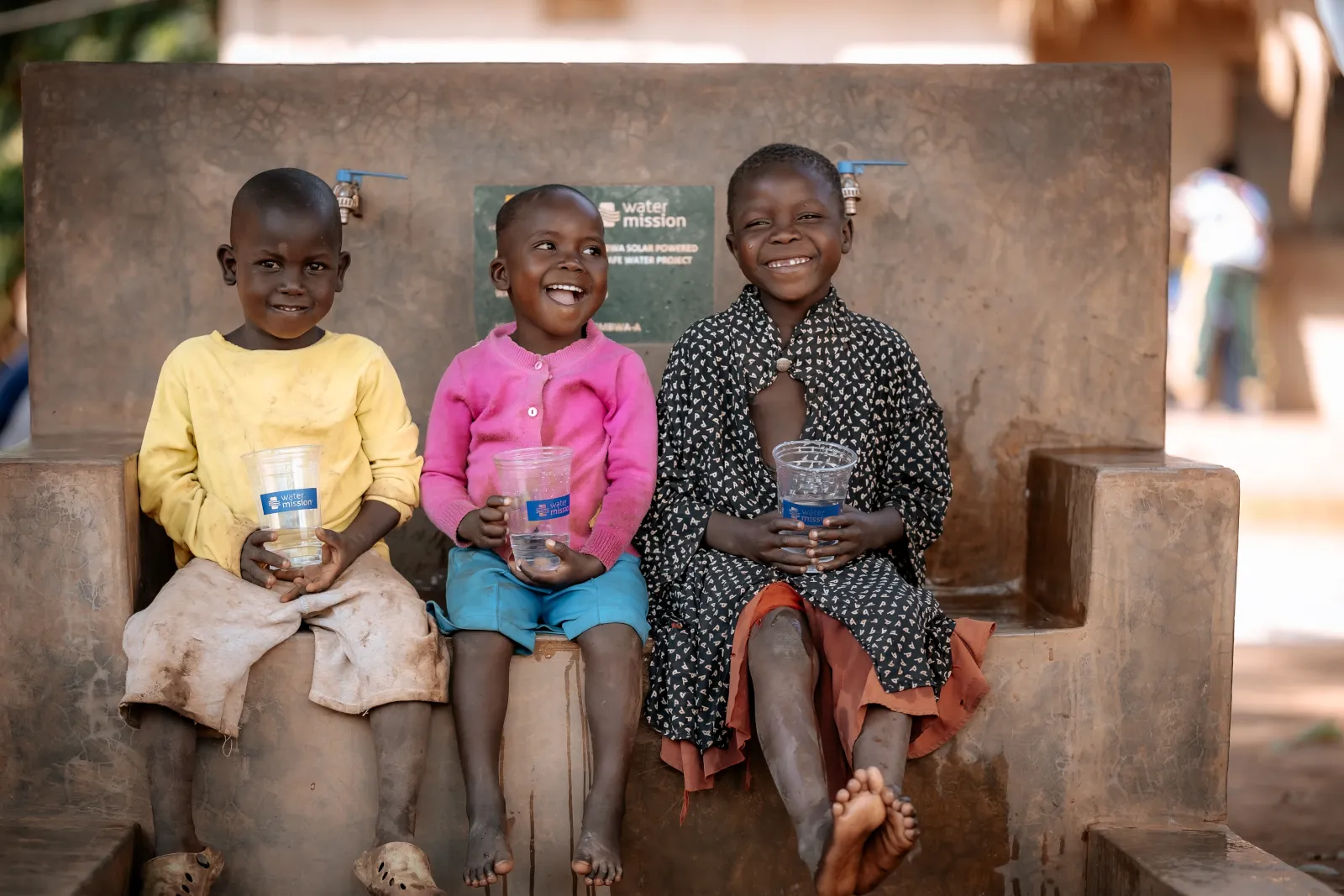 3 Kids Drinking Safe Water