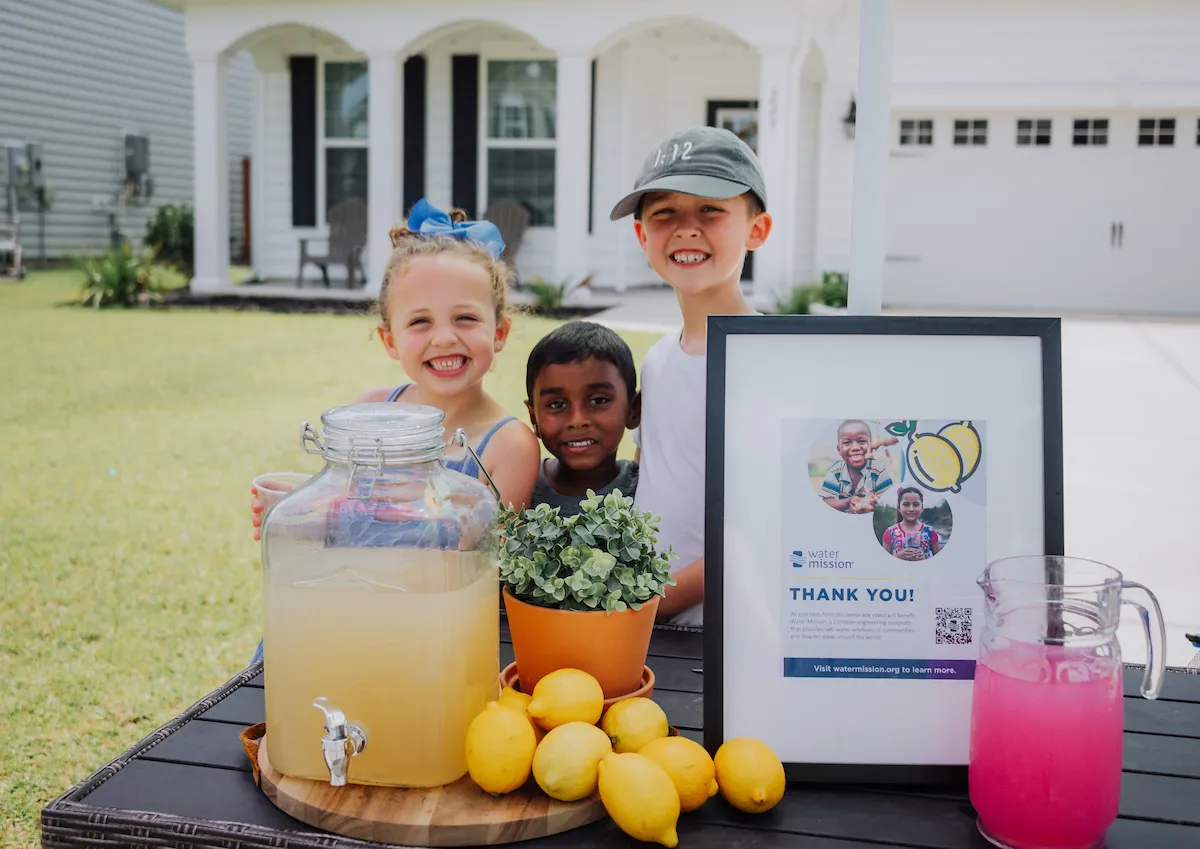 Three children sell lemonade to raise support for Water Mission