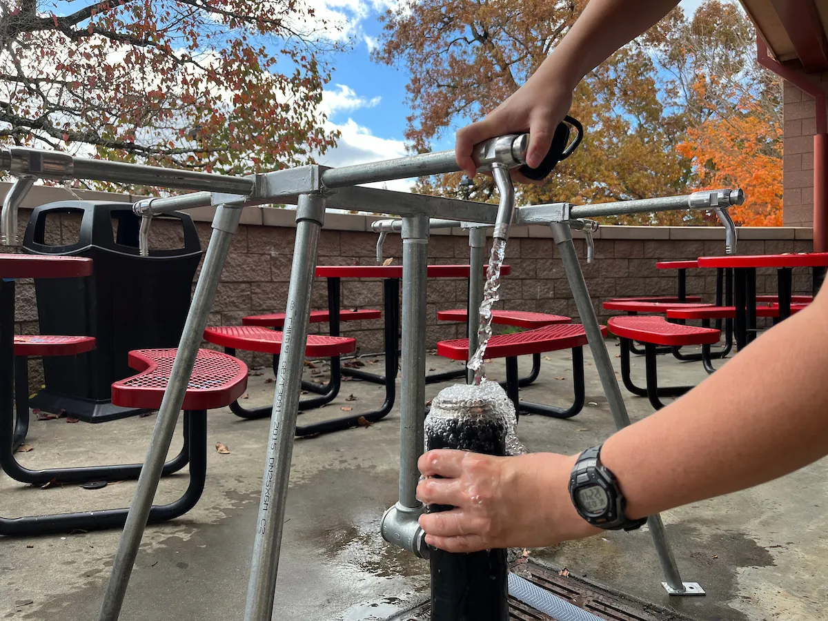 water bottle being filled
