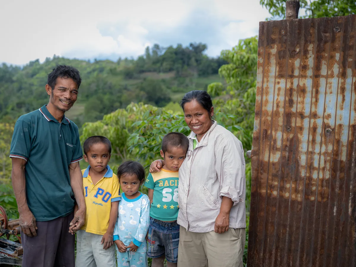 Family of four smiling