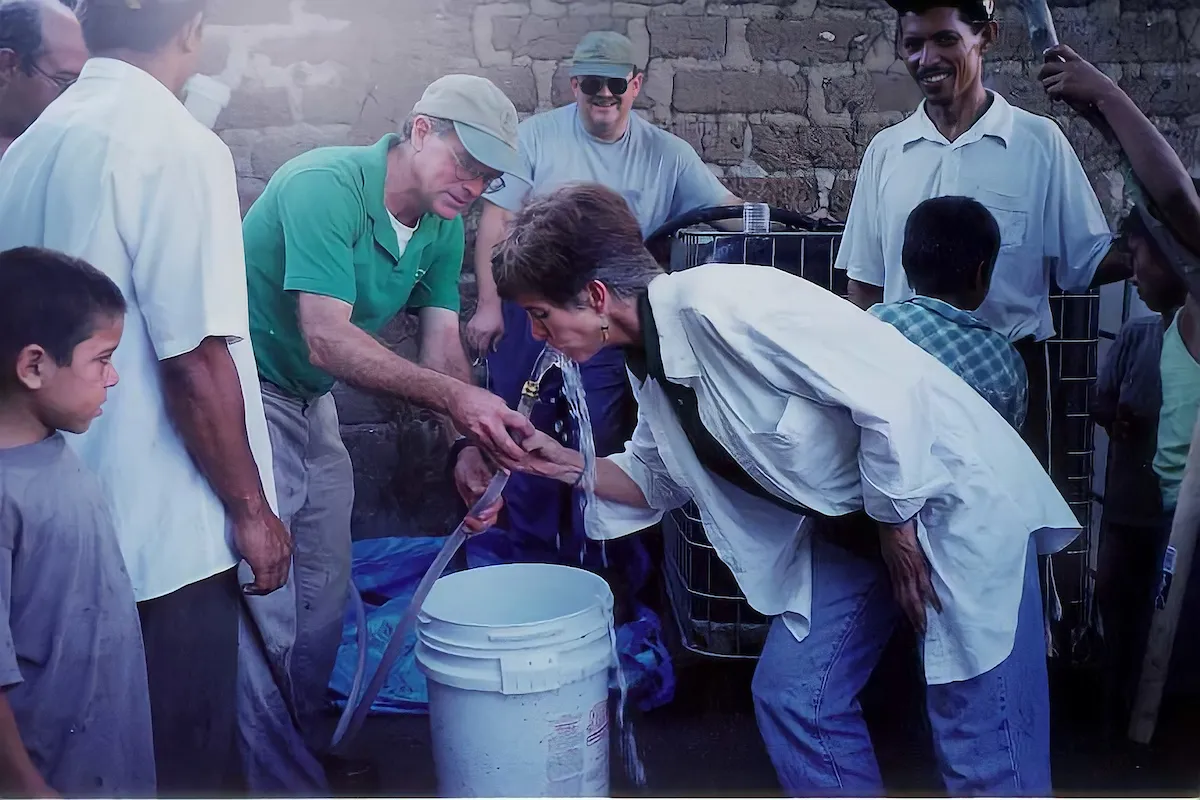 Water Mission founders take the first sip from an installed LWTS in Honduras.