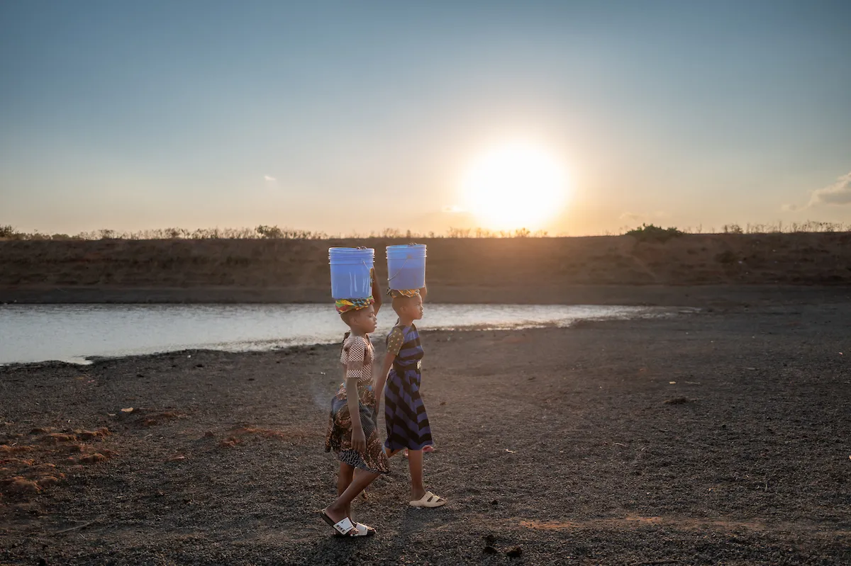 Girls in Tanzania, Africa walking for water