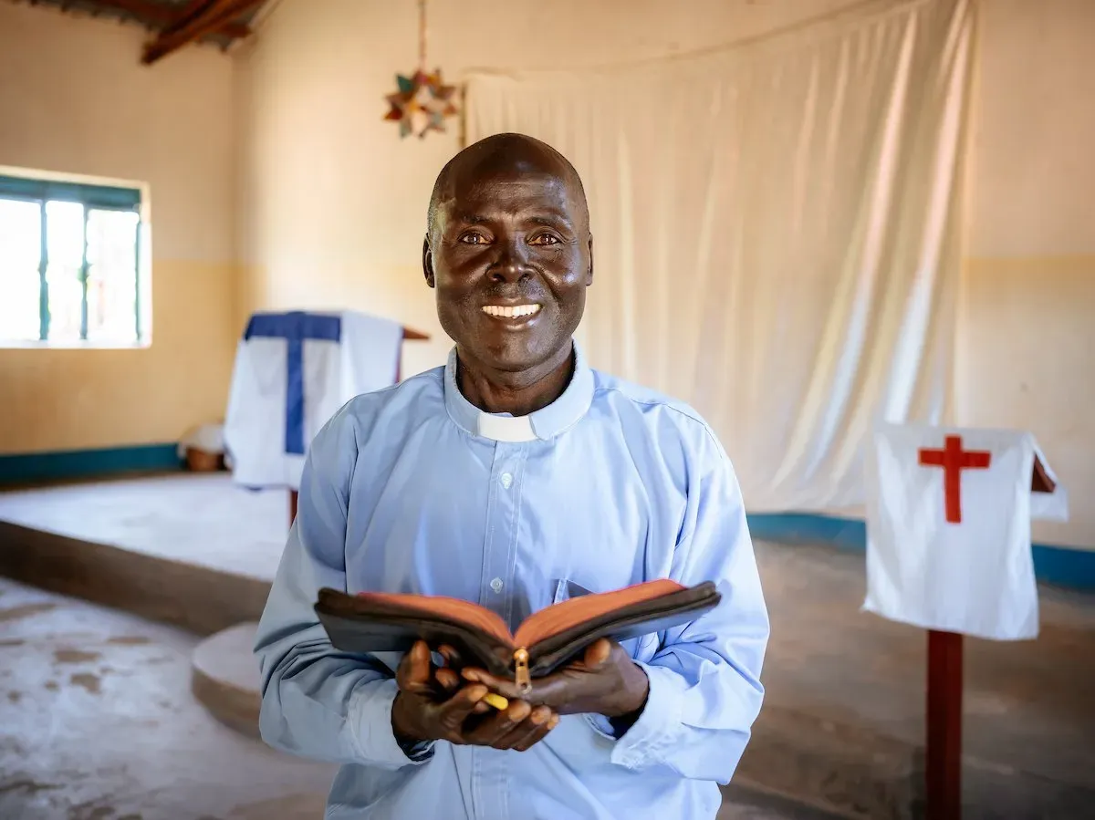 Pastor Laston with Bible