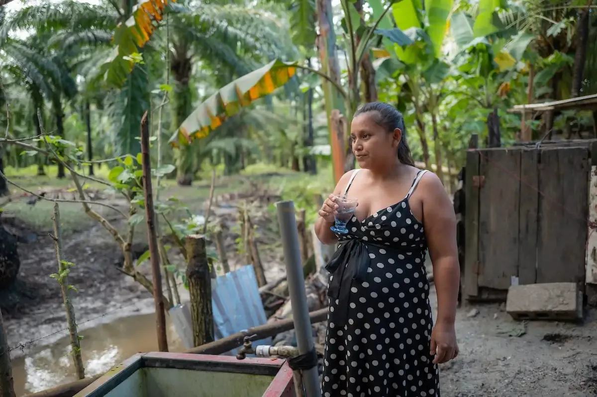 Jessica drinking safe water in Honduras