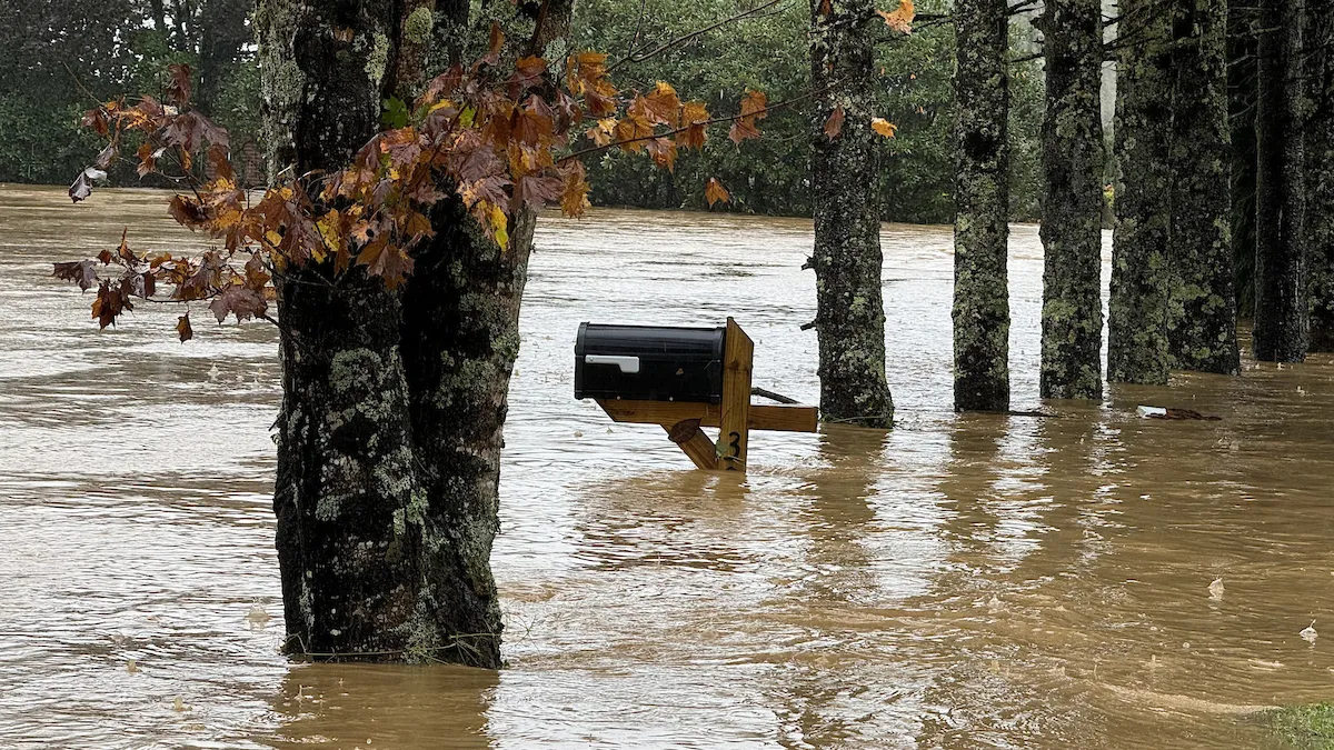 Flood waters reach the top of a mailbox