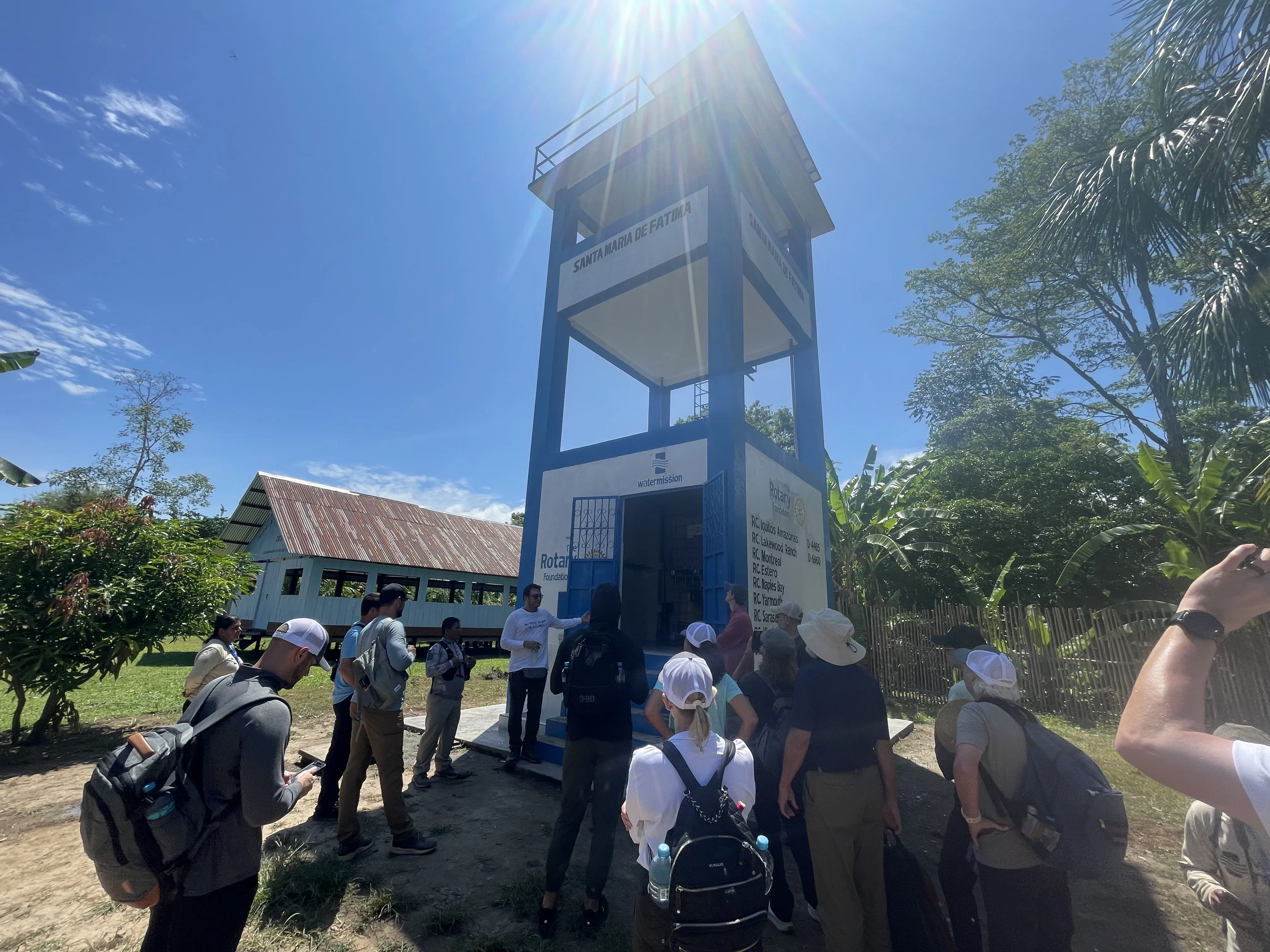 The group in front of a Water Mission safe water project