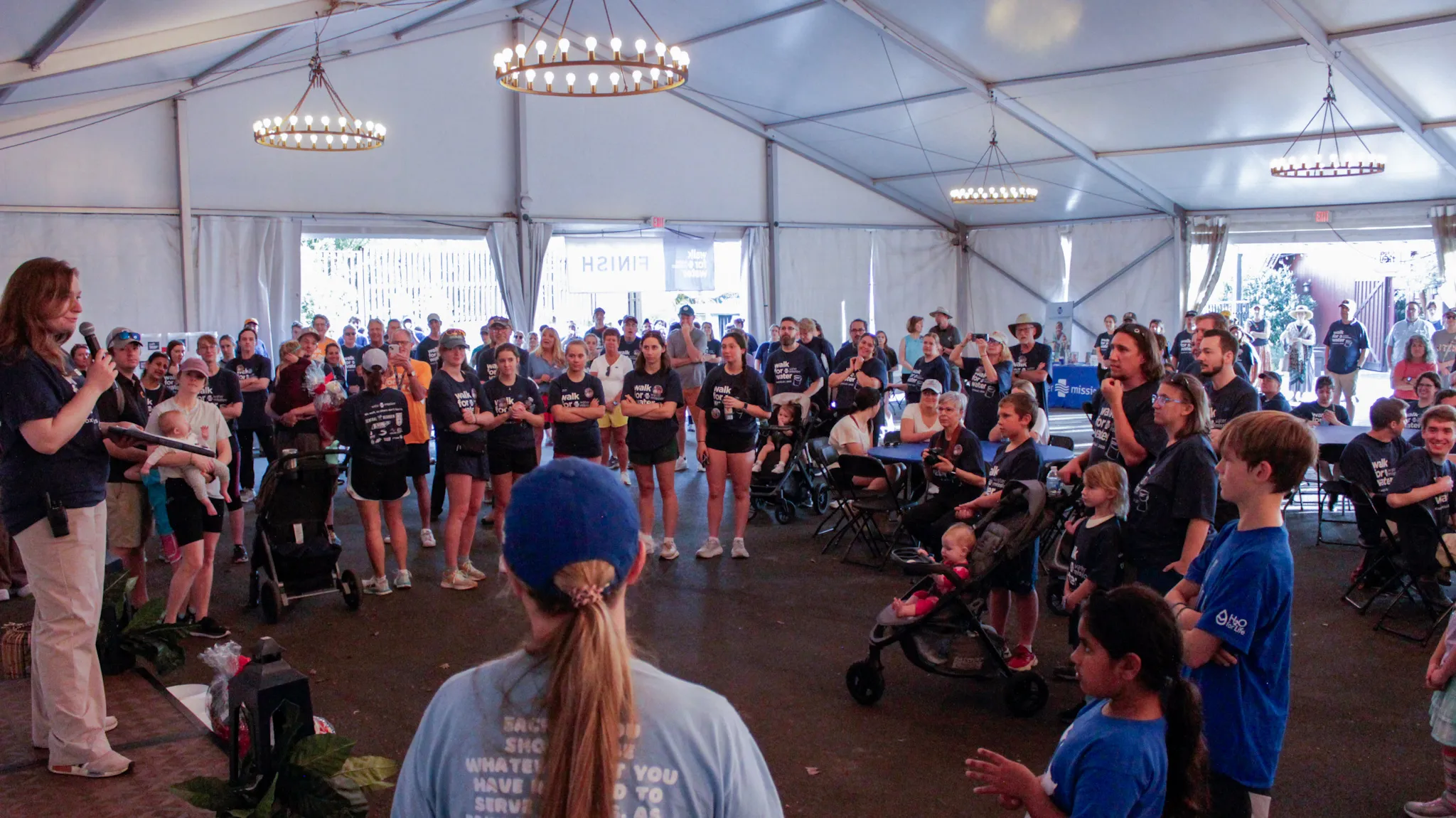 Knxoville walkers gather under a tent