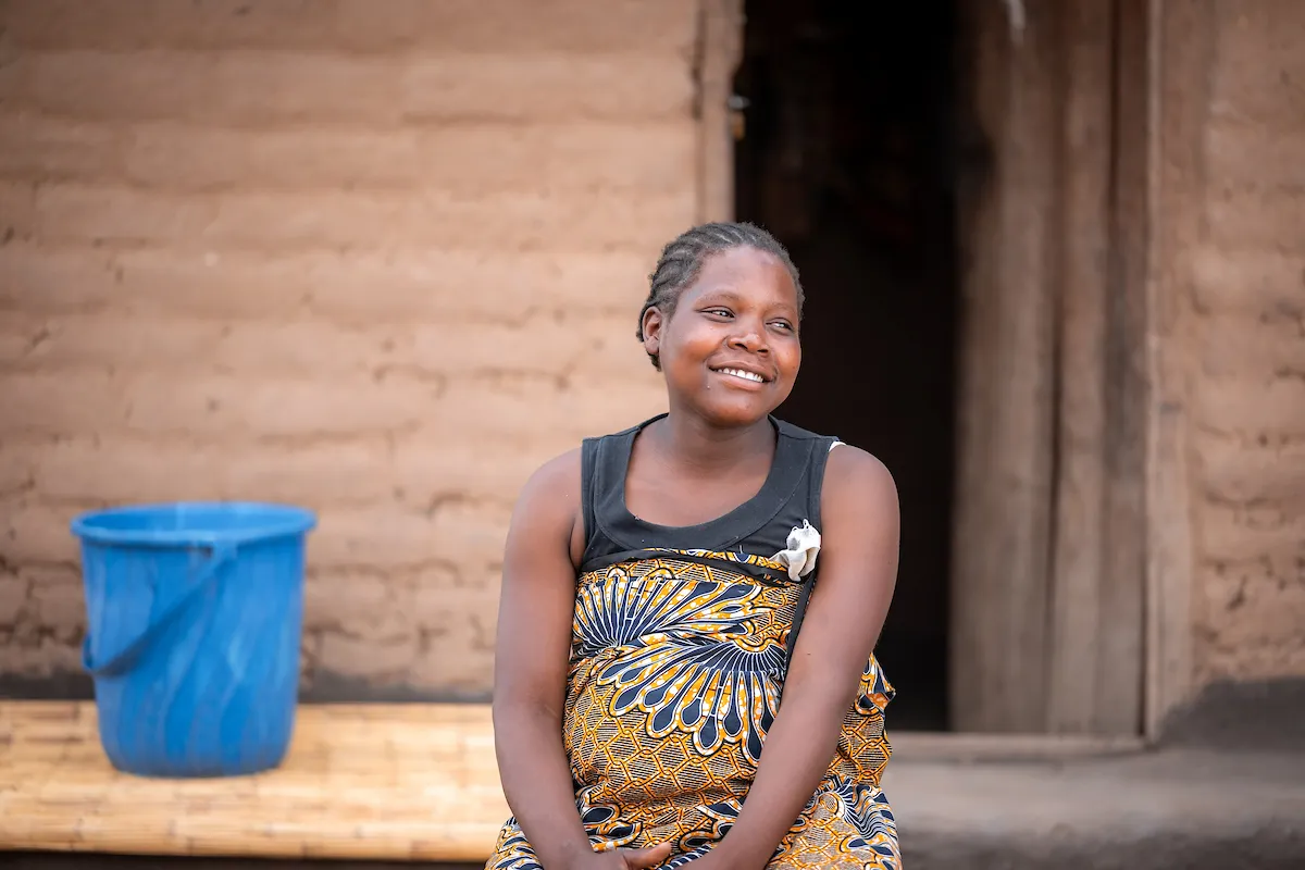 African woman smiles