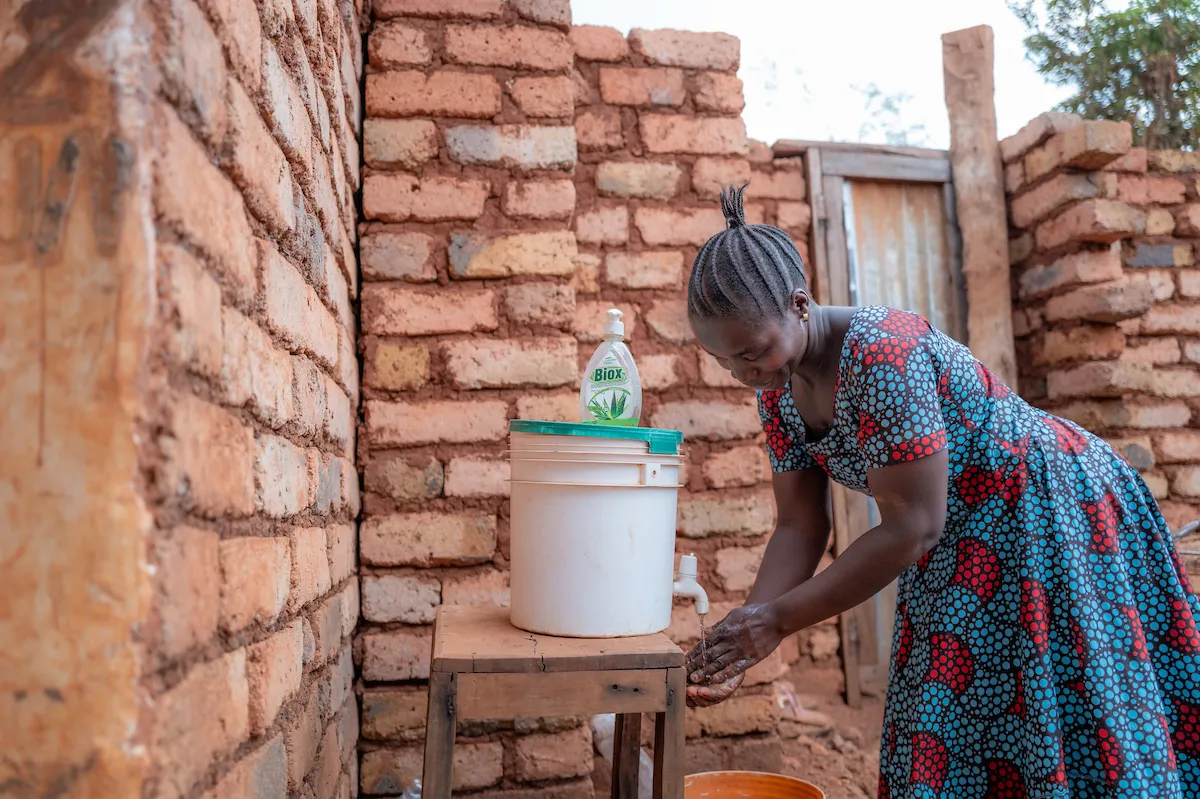A woman washing her hands