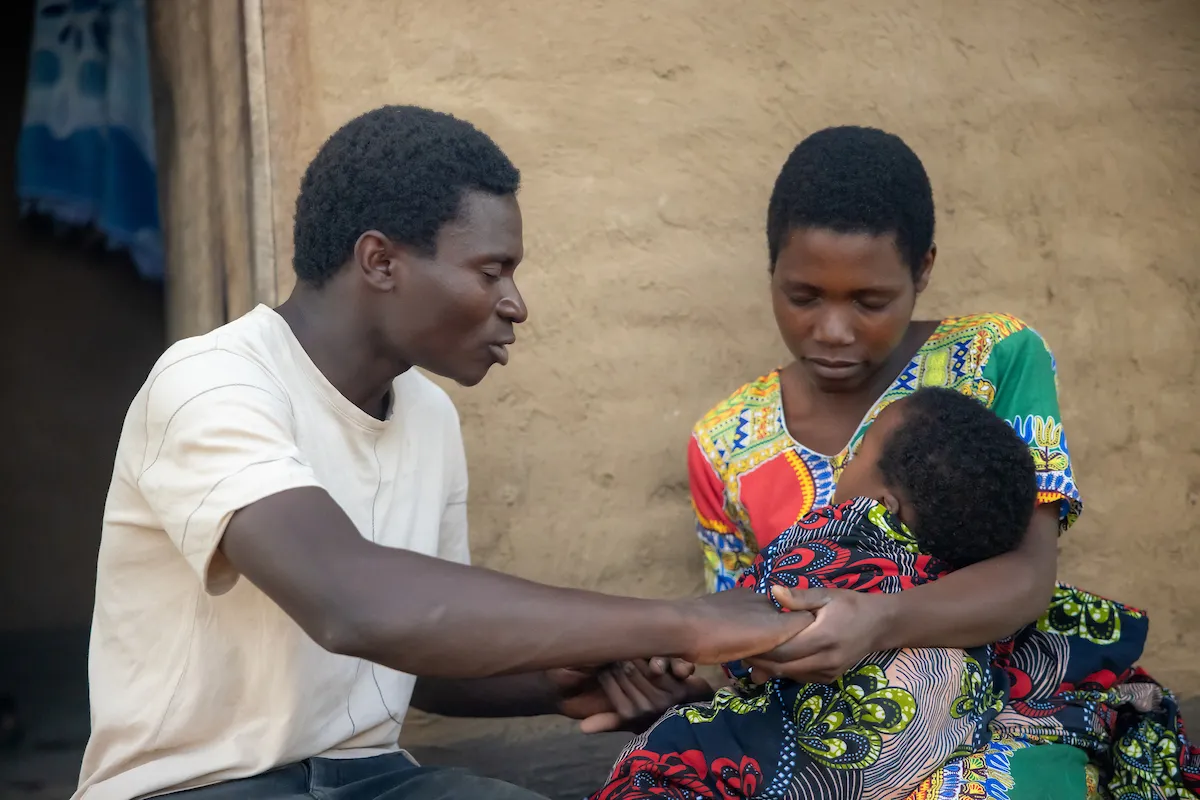 Matrida and her husband, Robert, with their baby, Andrew