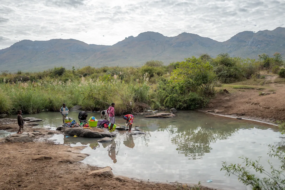 People in Africa at a stagnant water source