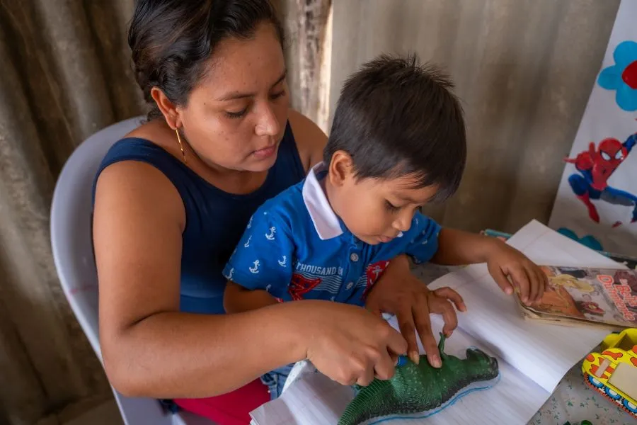 “If I didn’t have to use the time [collecting water],” says Grey, “I would have more time to teach my son.”