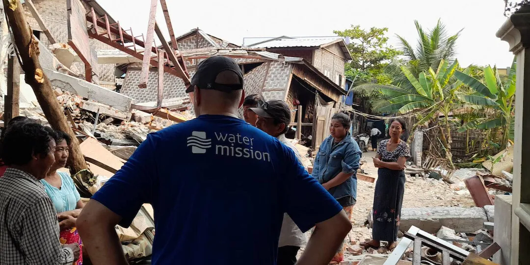 Craig Williams talks to locals in Myanmar