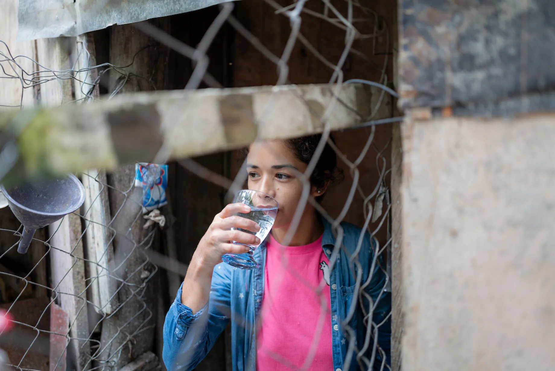 Rosa takes a drink of water
