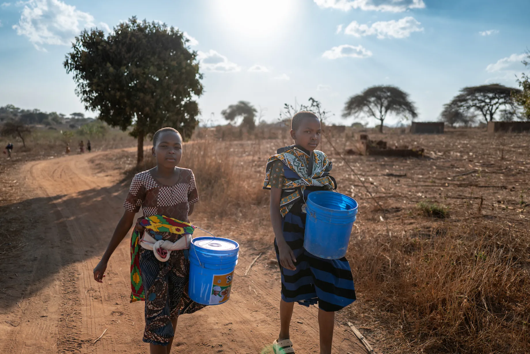 Children in Tanzania, Africa walk for water