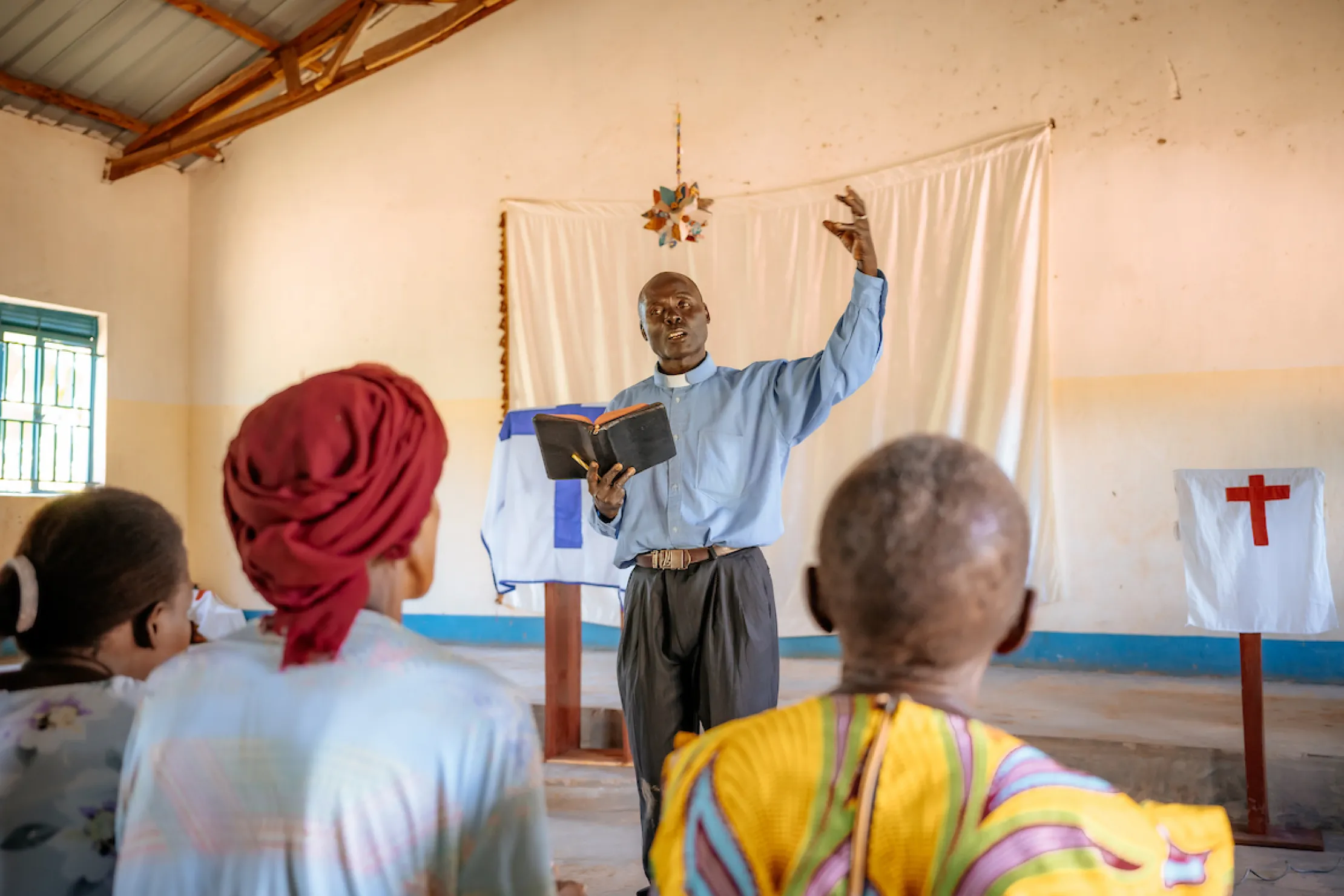 Pastor Laston preaching