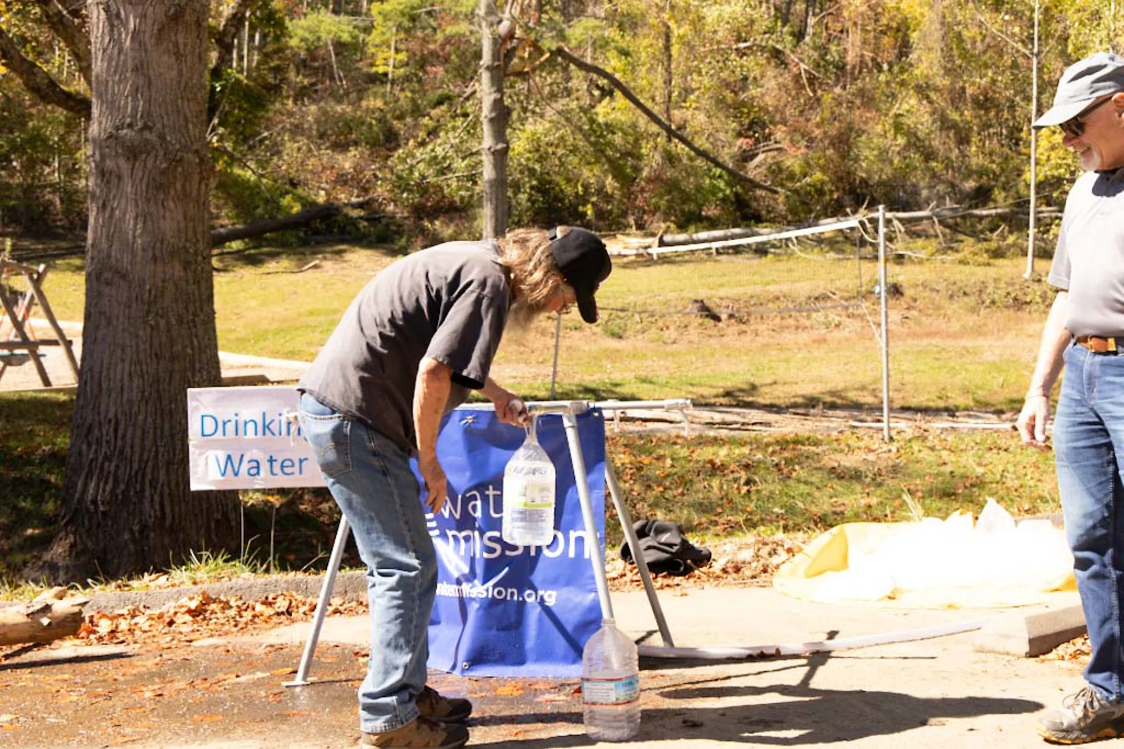 A man collects safe water