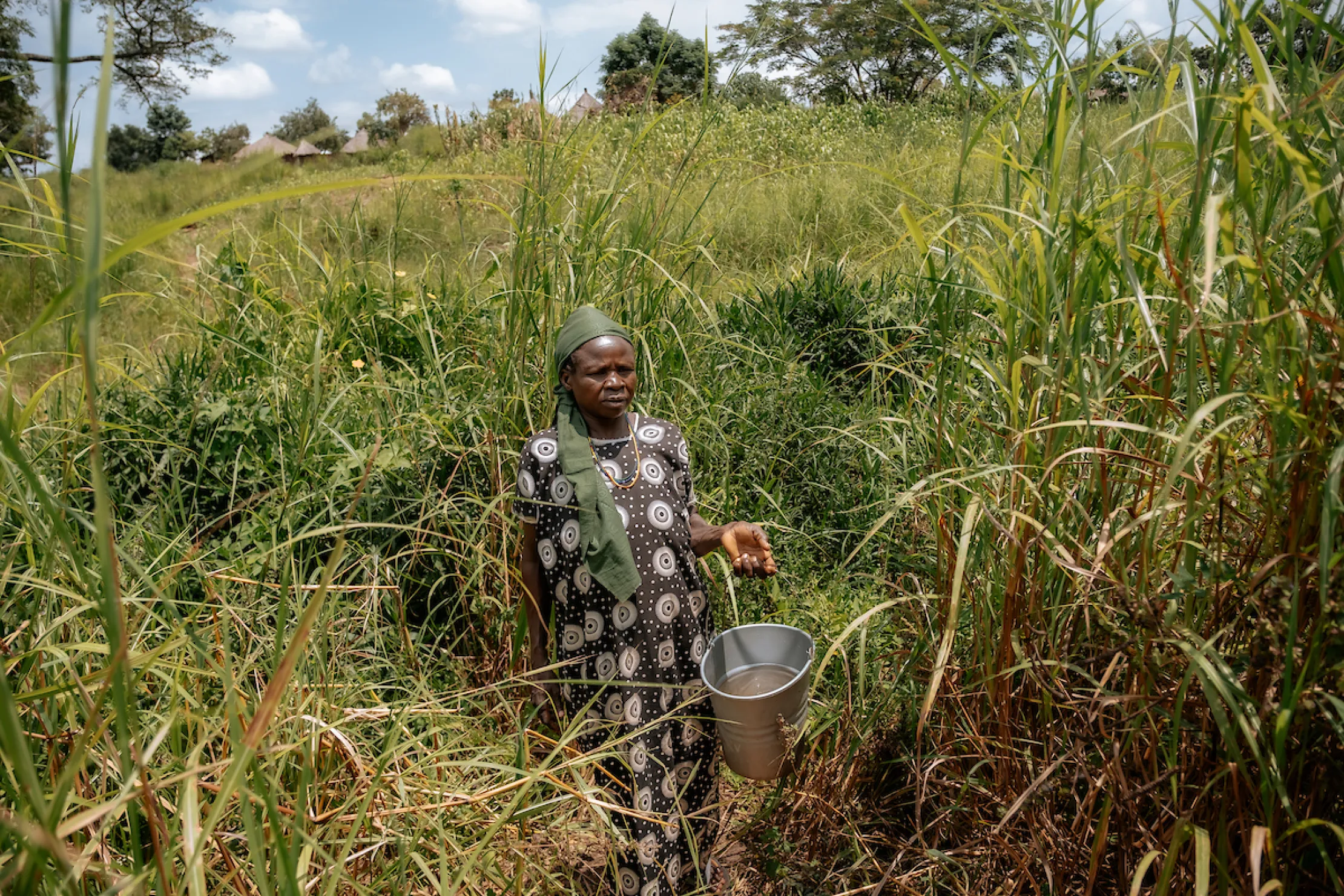 A woman in Africa fetching dirty water