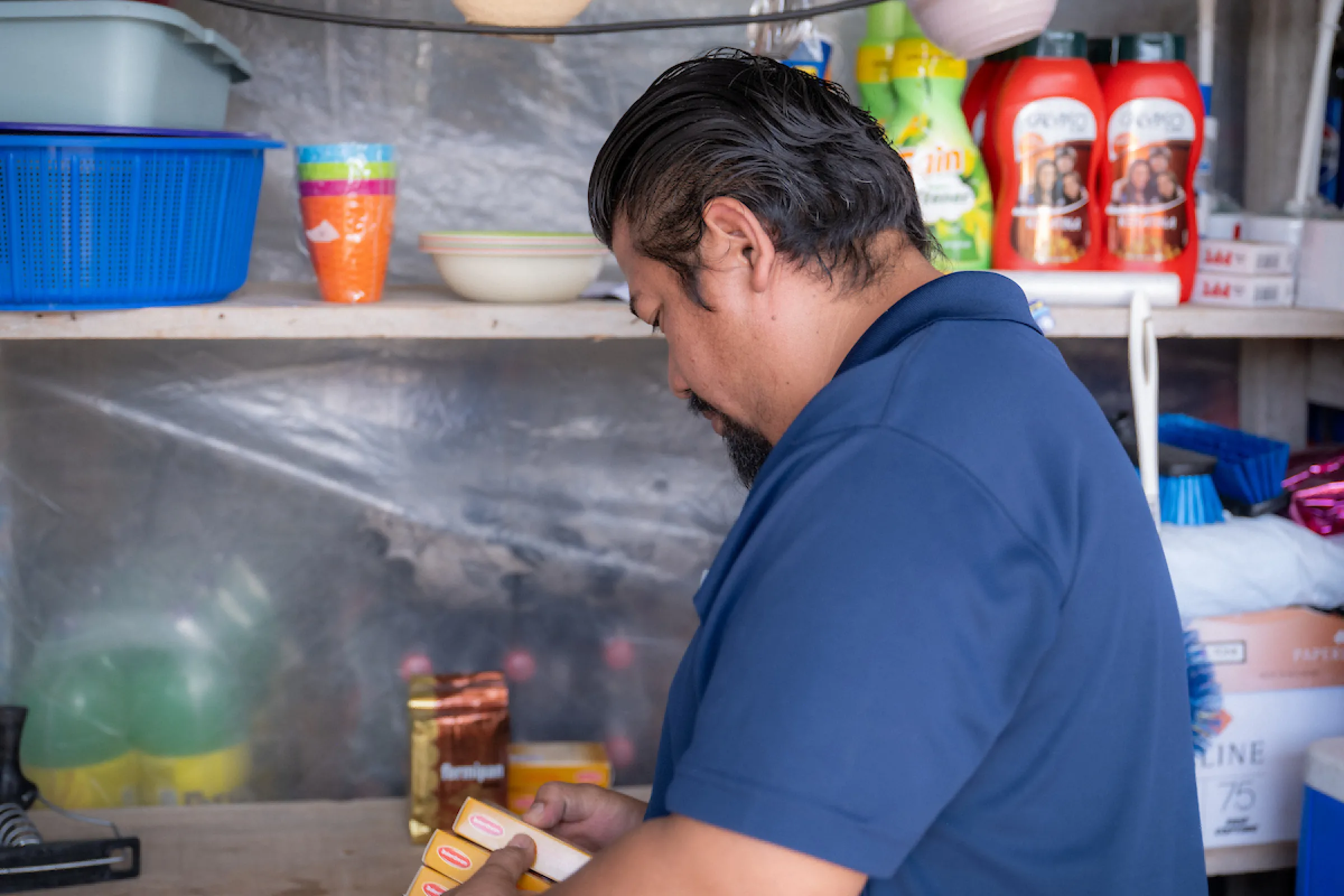 Denis at his business