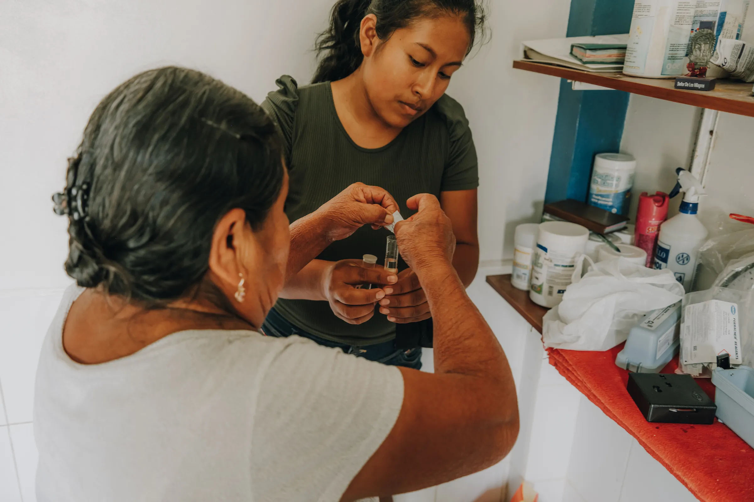 Two women testing water