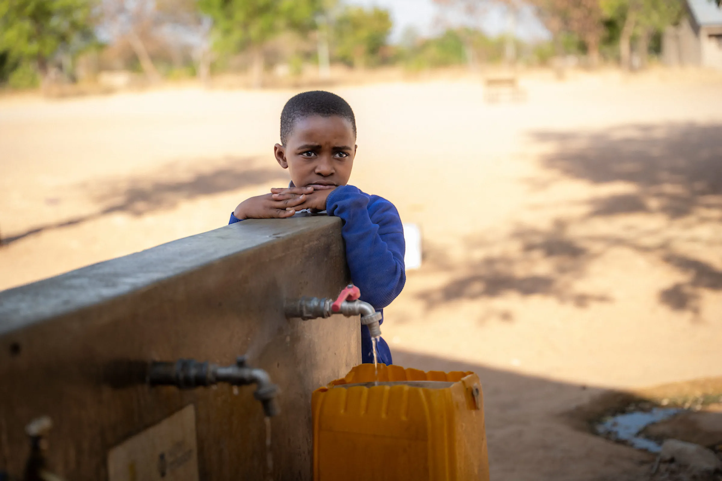 Tanzanian girl at safe water access point