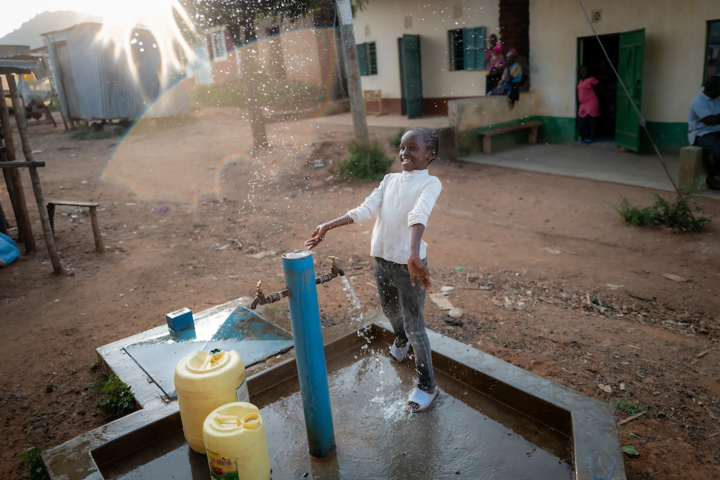 Girl celebrates safe water in Kenya, Africa
