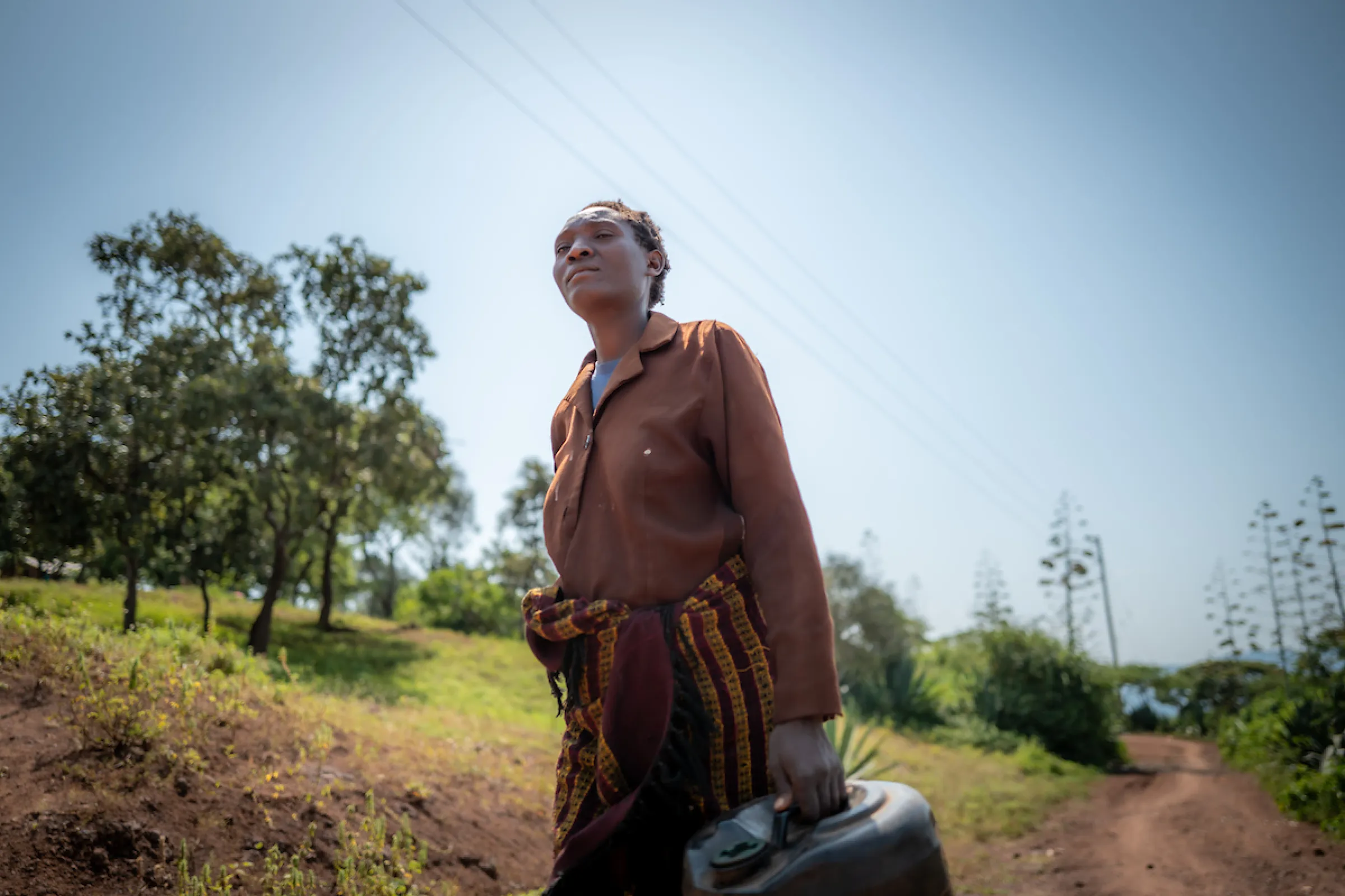 A woman in Africa walks for water
