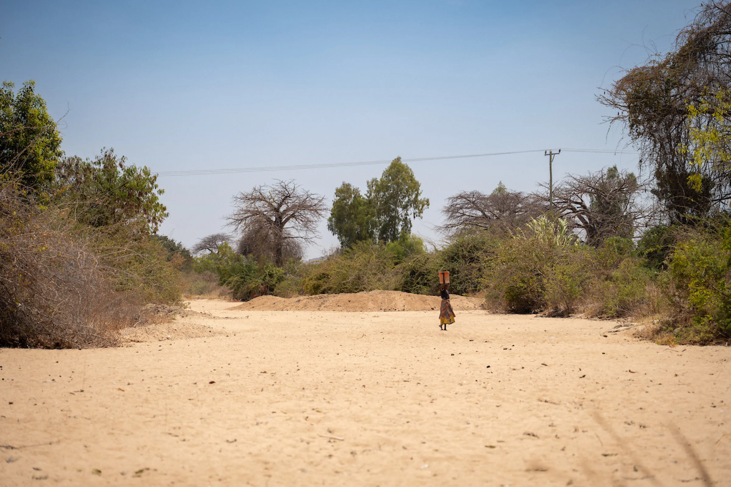 Girl in Tanzania walking for water