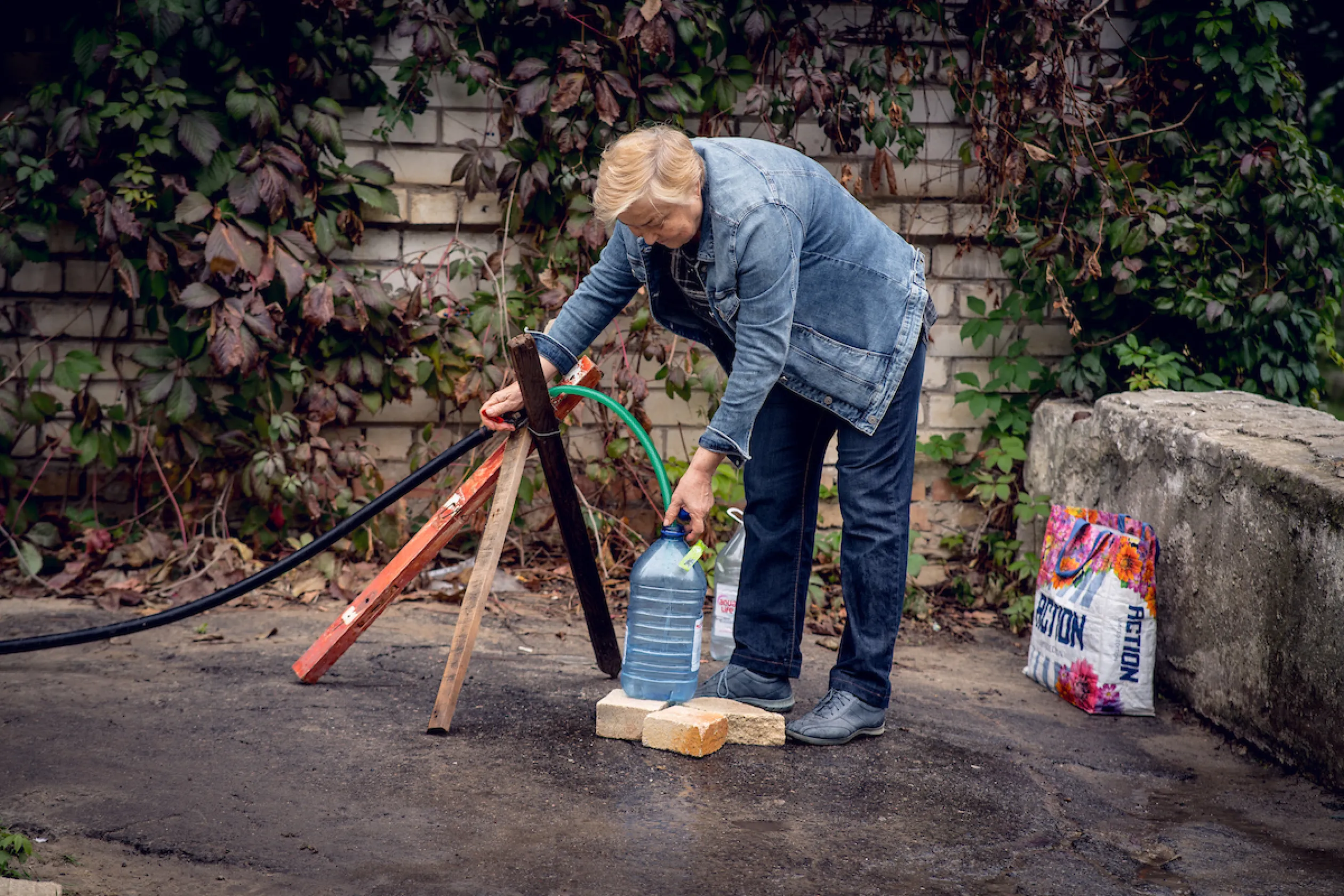 A woman collects water