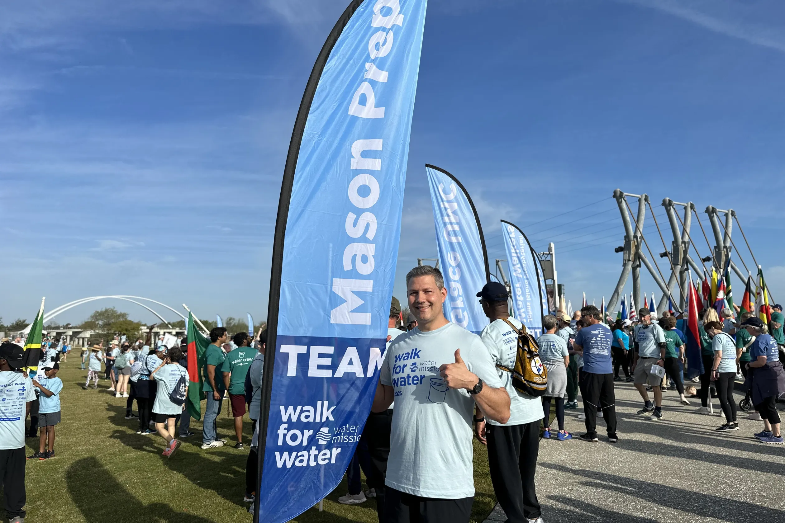 Volunteer giving thumbs up