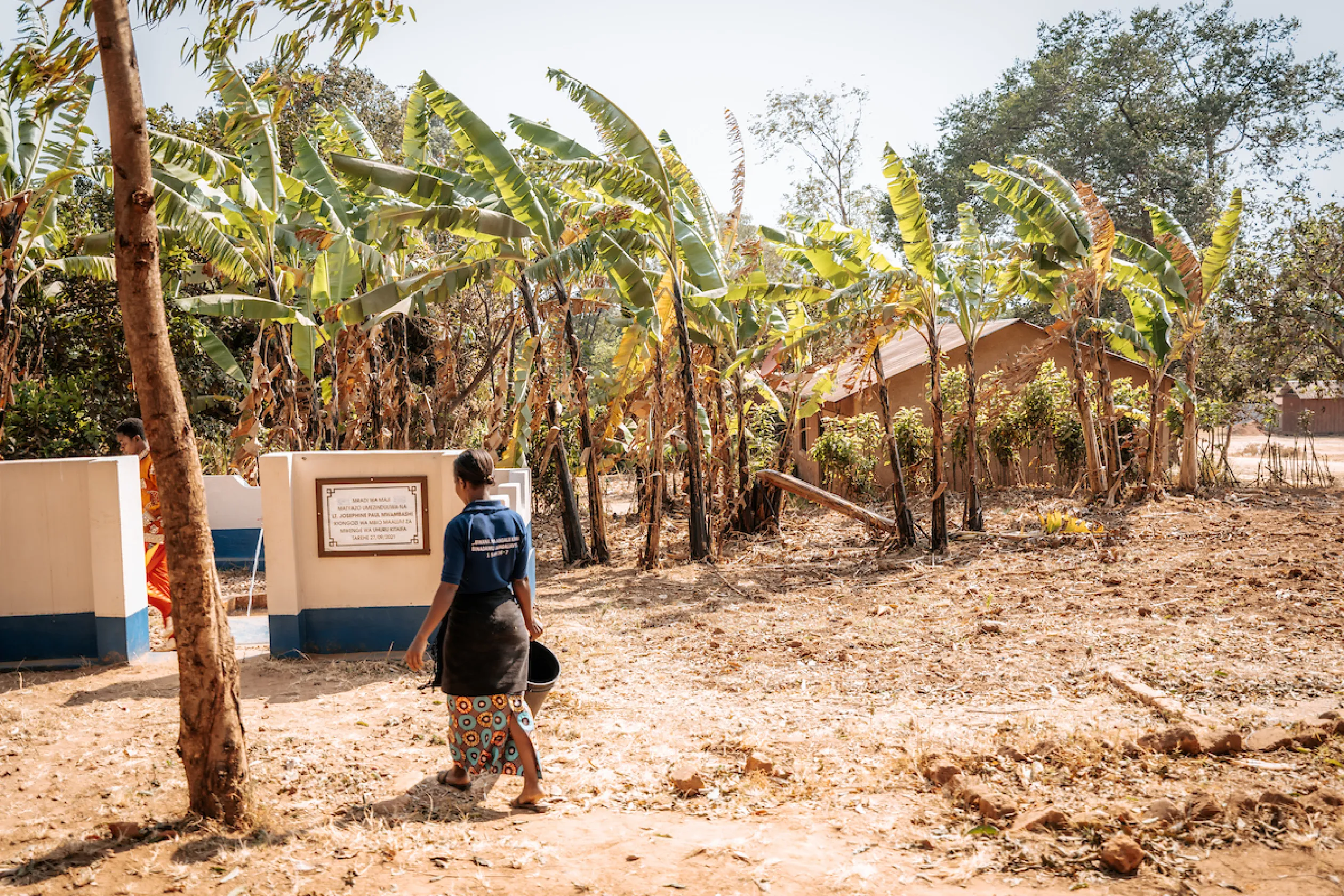 Jackline walks to safe water access point