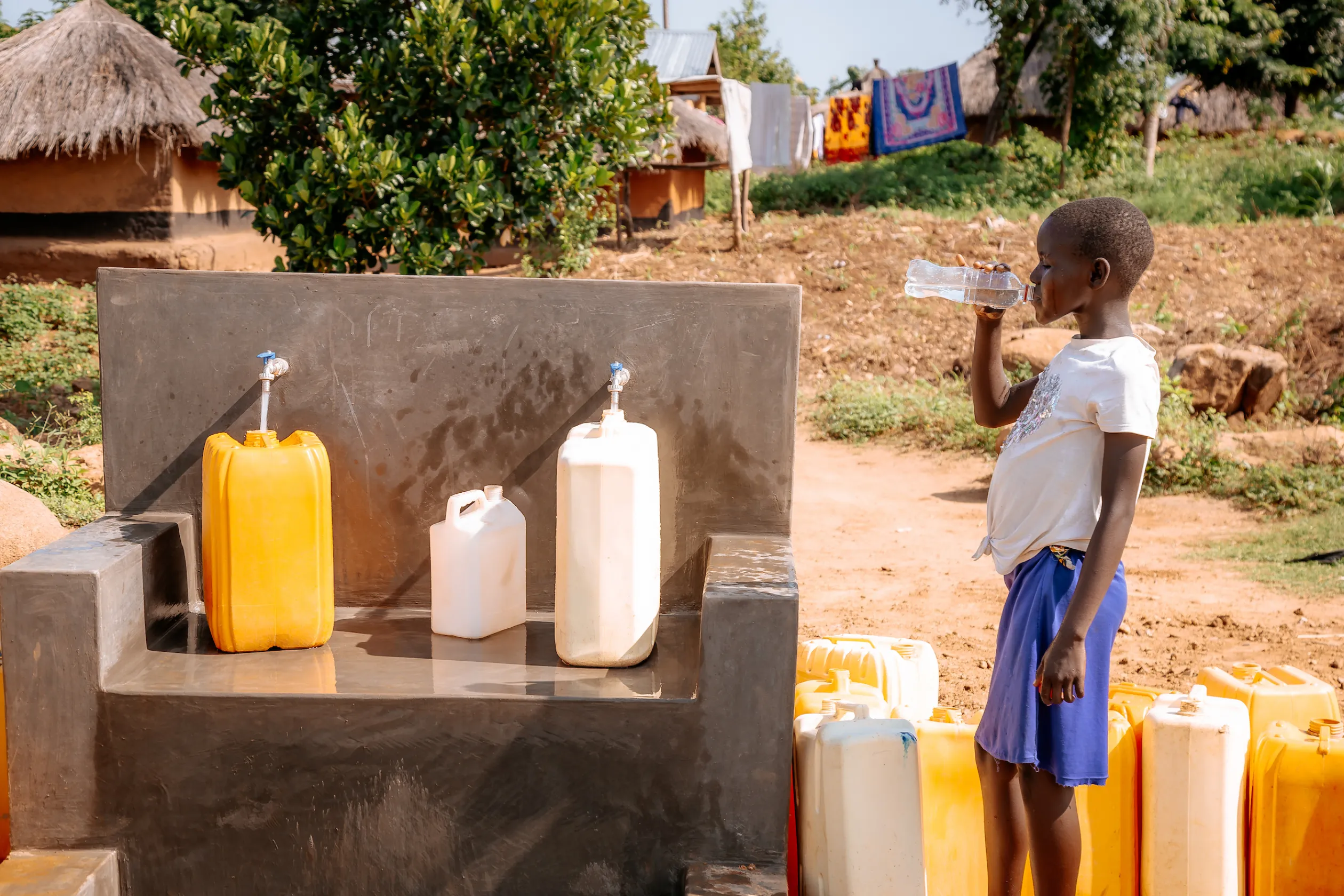 Girl drinking safe, clean water