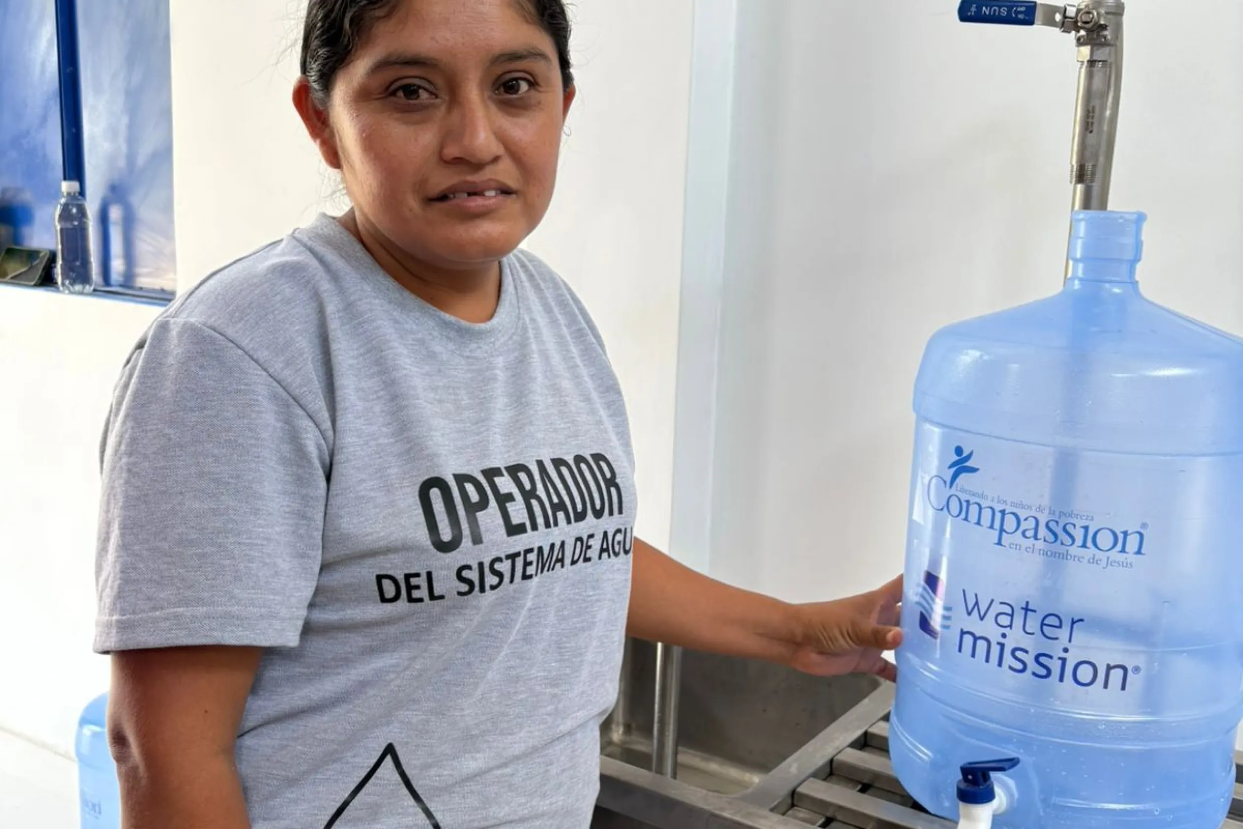 Operator of the safe water system in Peru