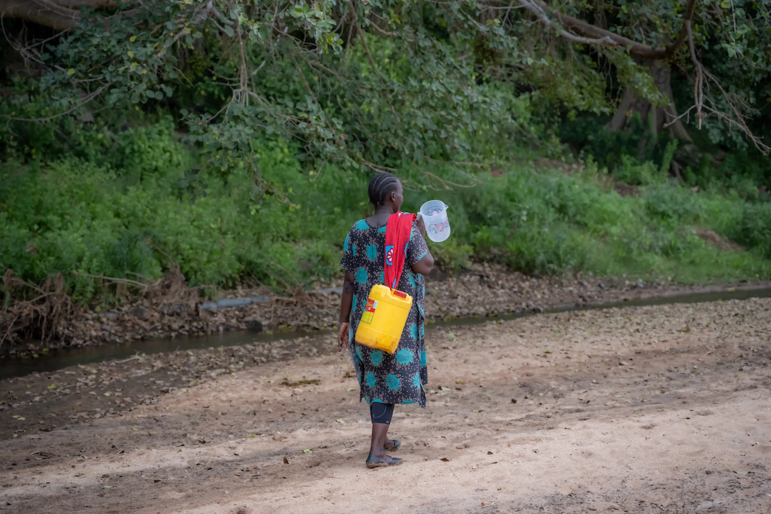 Lucy walking for water in Kenya, Africa