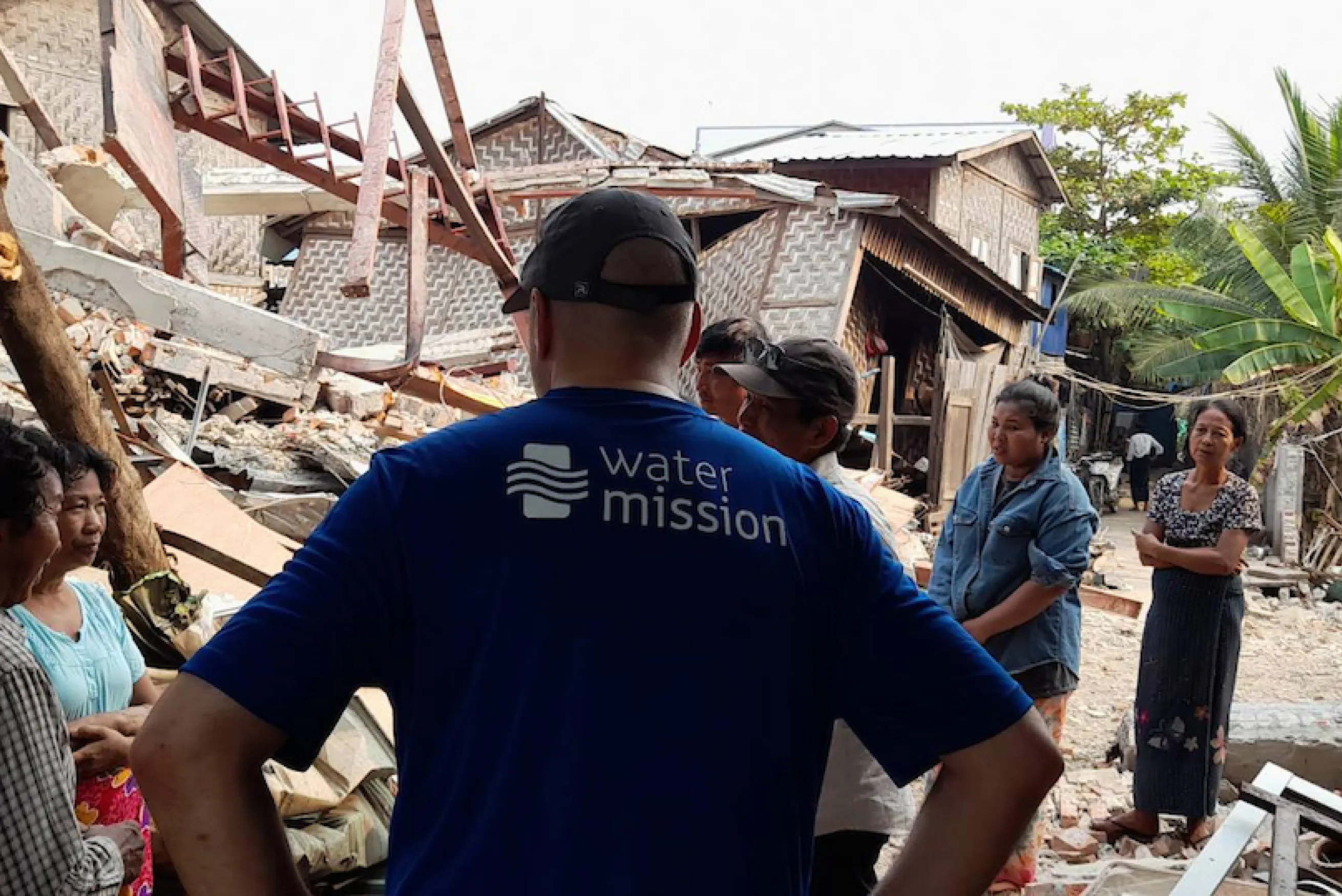 Water Mission staff members surveys damage