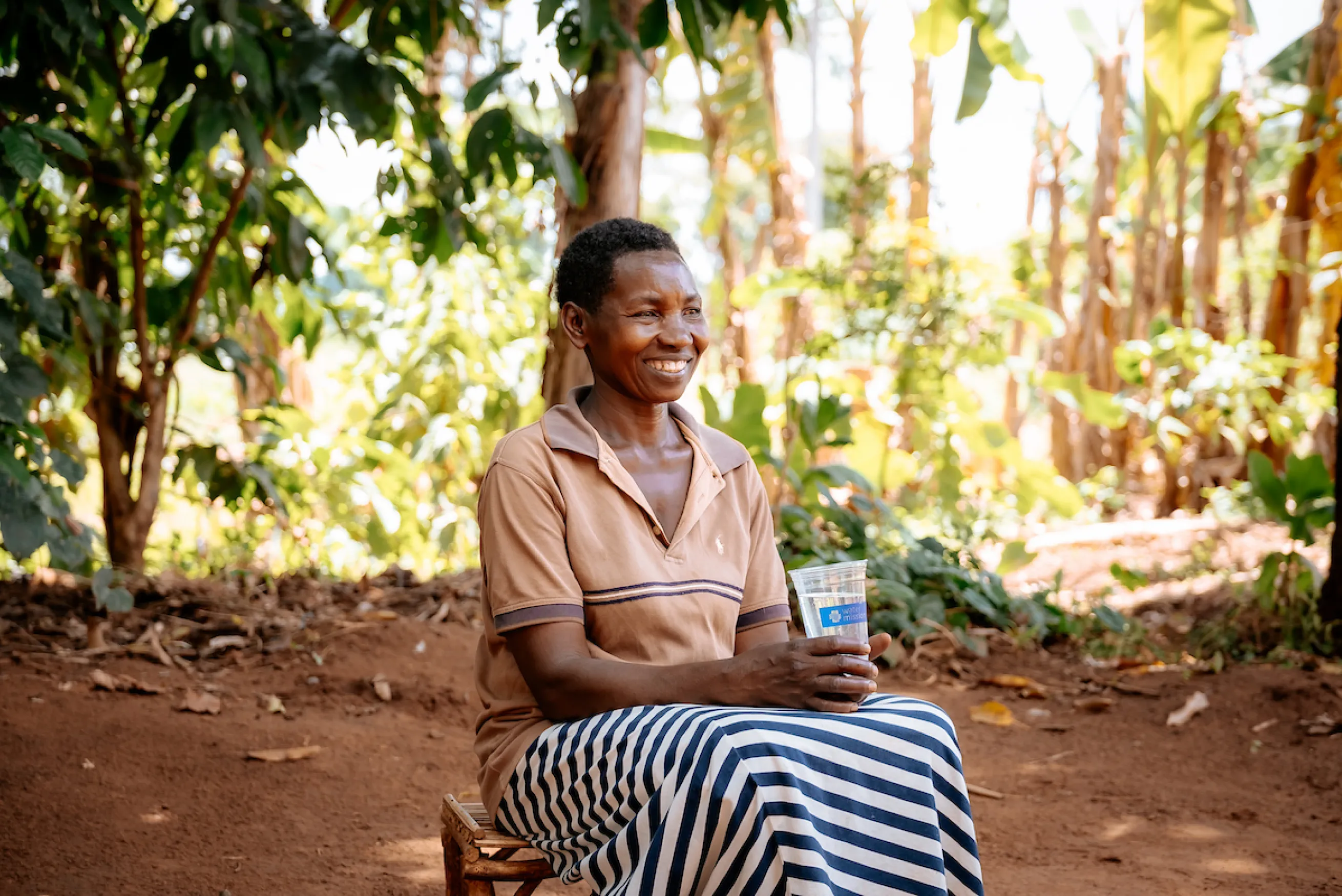 Betty, a woman in Uganda, whose husband passed away from a waterborne illness