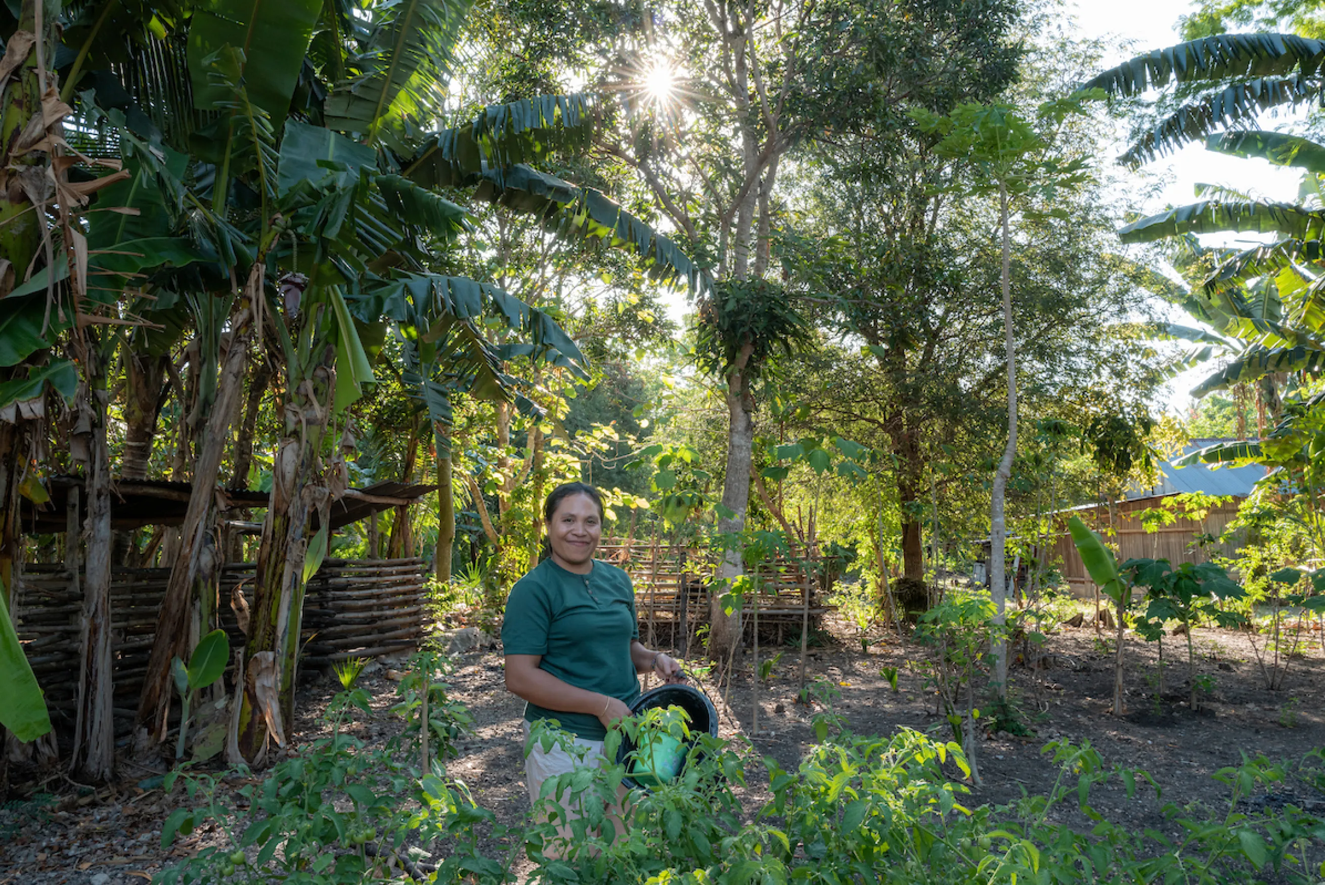 Delti smiling in her garden
