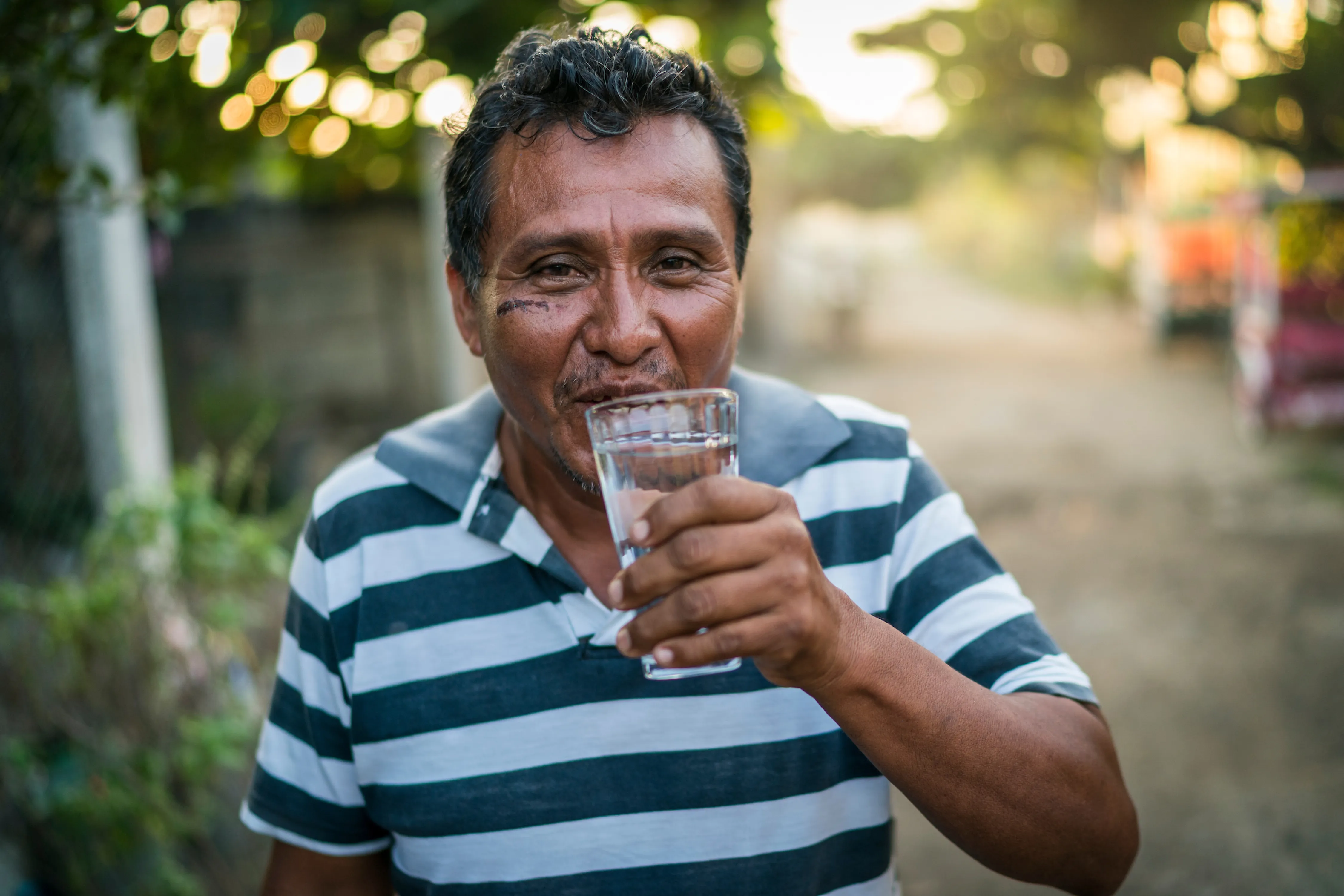 Man drinking safe water