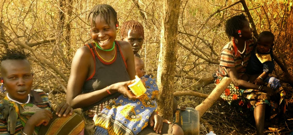 Rejoicing over the arrival of safe water for her family