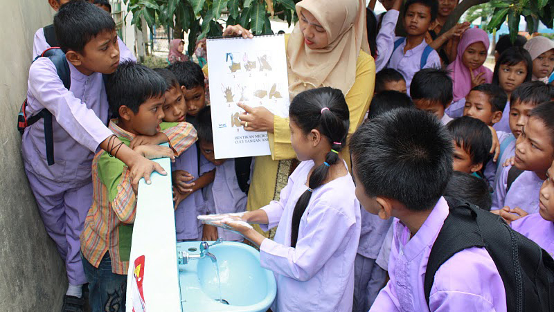Give a community the joy of educating their neighbors. | WASH Promotion