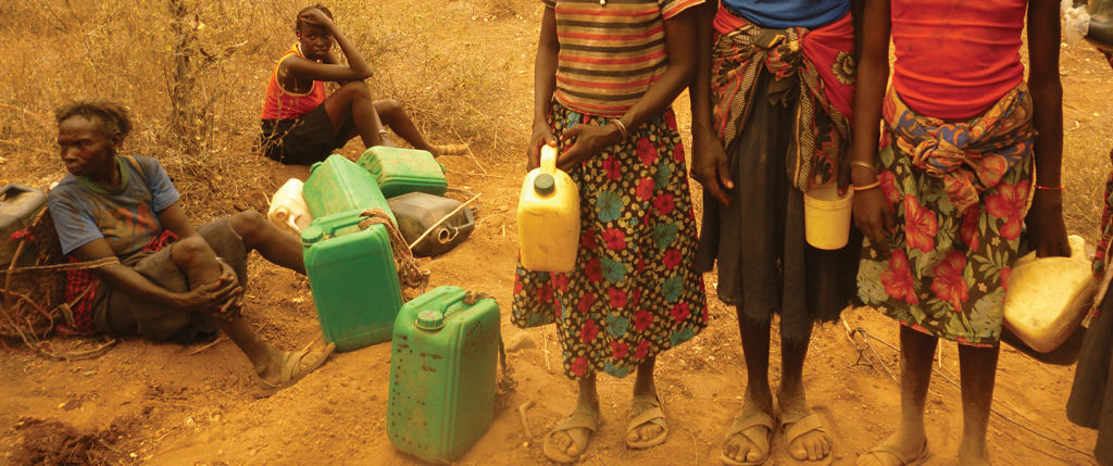 Women with jerry cans