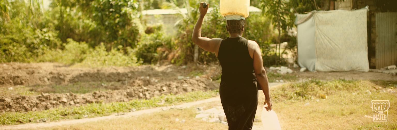 Woman walking for water | Esther Havens, Haiti