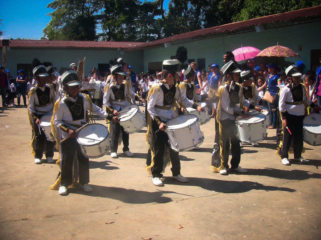 The Scotty's Ride group is welcomed by a marching band